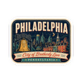 Retro luggage tag sticker showing Philadelphia text with skyline buildings and bell emblem