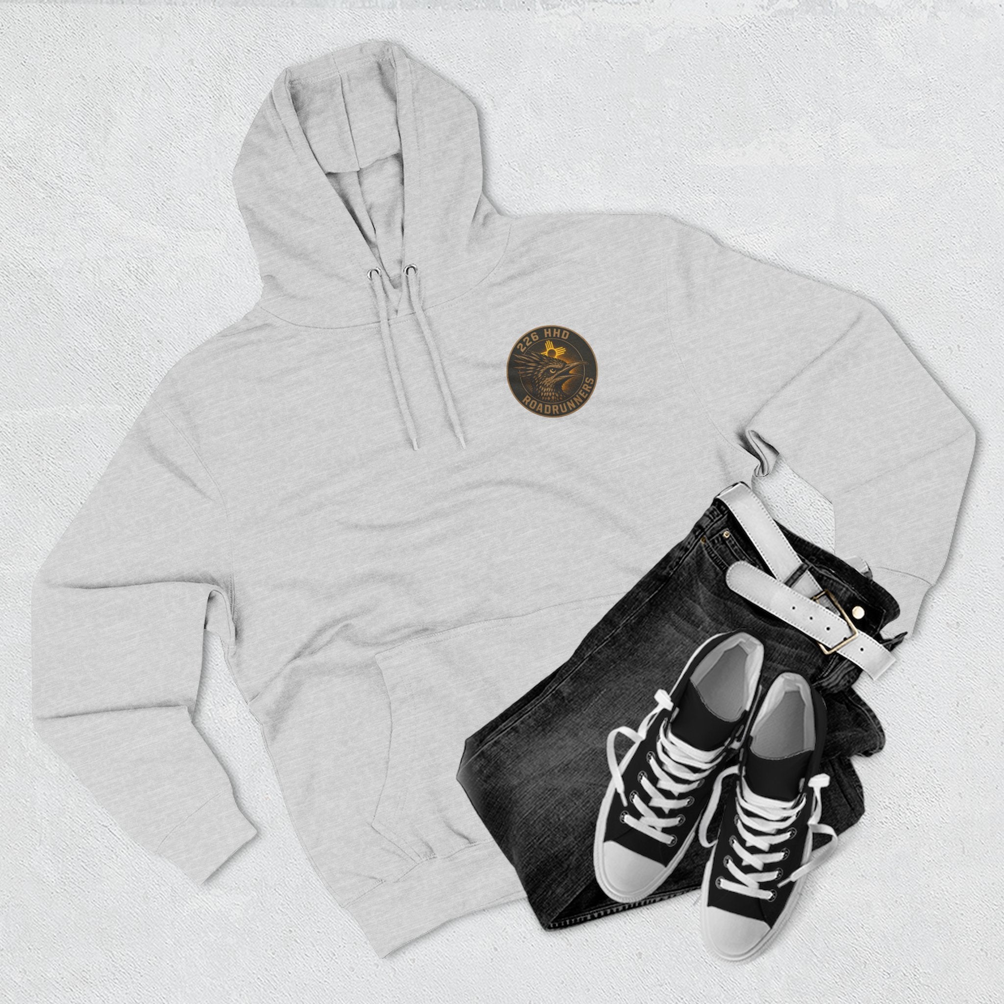 Heather gray pullover hoodie with front pocket, drawstring hood, small chest patch