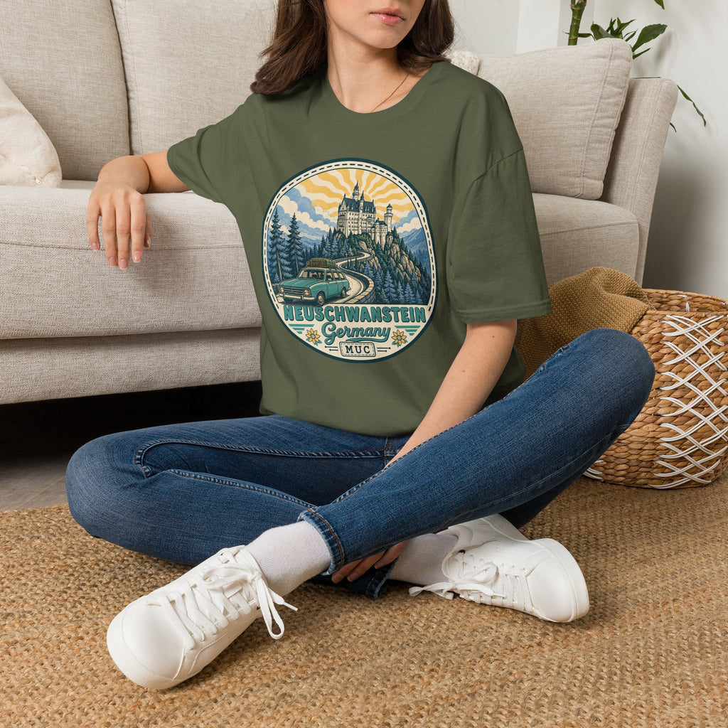 Olive green graphic T-shirt with circular Neuschwanstein castle illustration on chest