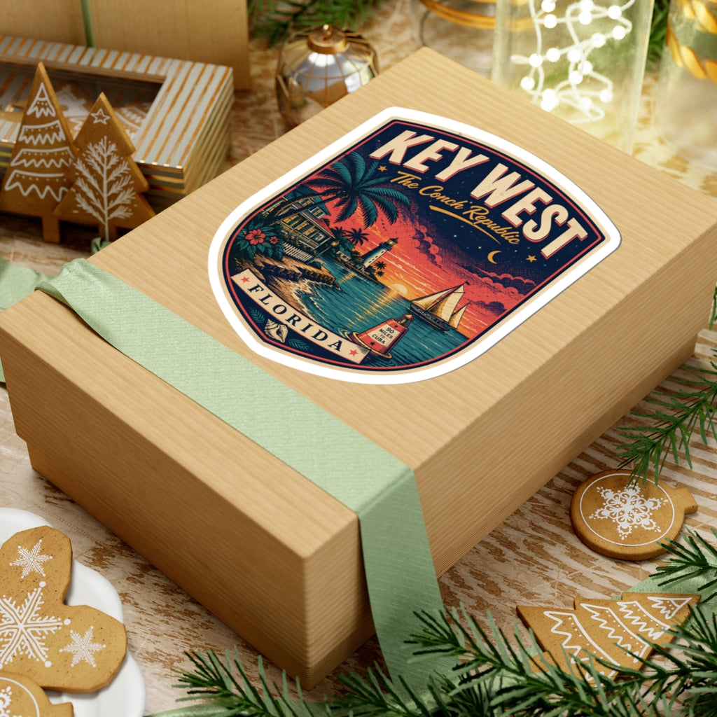 Key West luggage tag sticker on a wrapped present, palm harbor scene with 'KEY WEST' and 'FLORIDA'