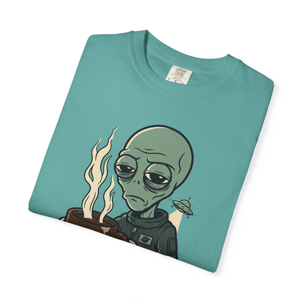 Teal alien coffee T-shirt with flaming alien character graphic