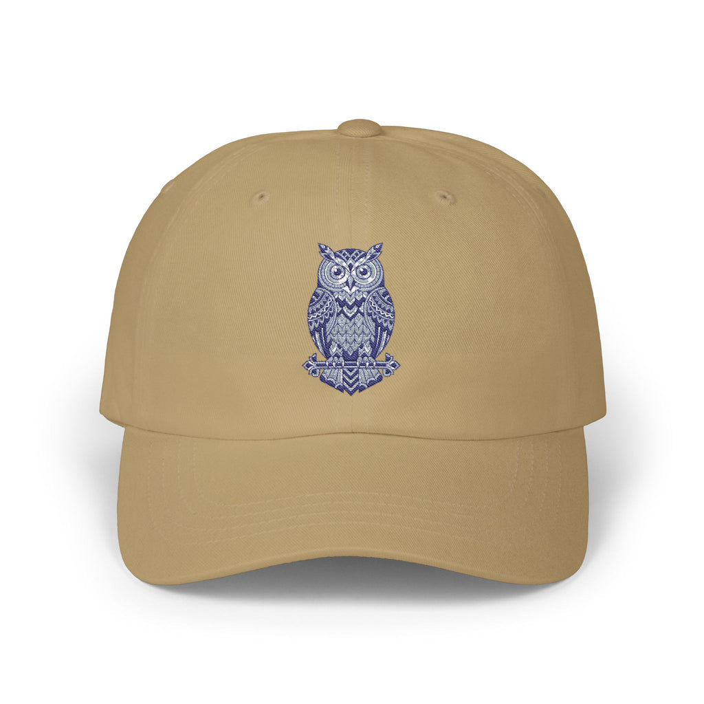 Tan owl-embroidered dad cap with curved brim and stitched crown vents