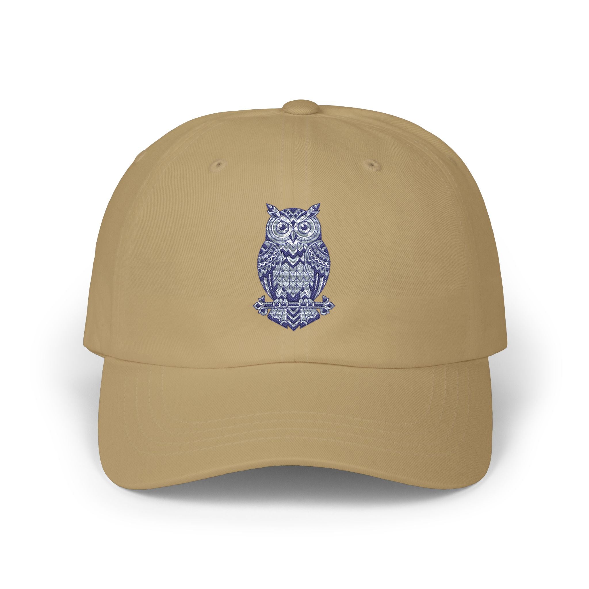 Tan owl-embroidered dad cap with curved brim and stitched crown vents