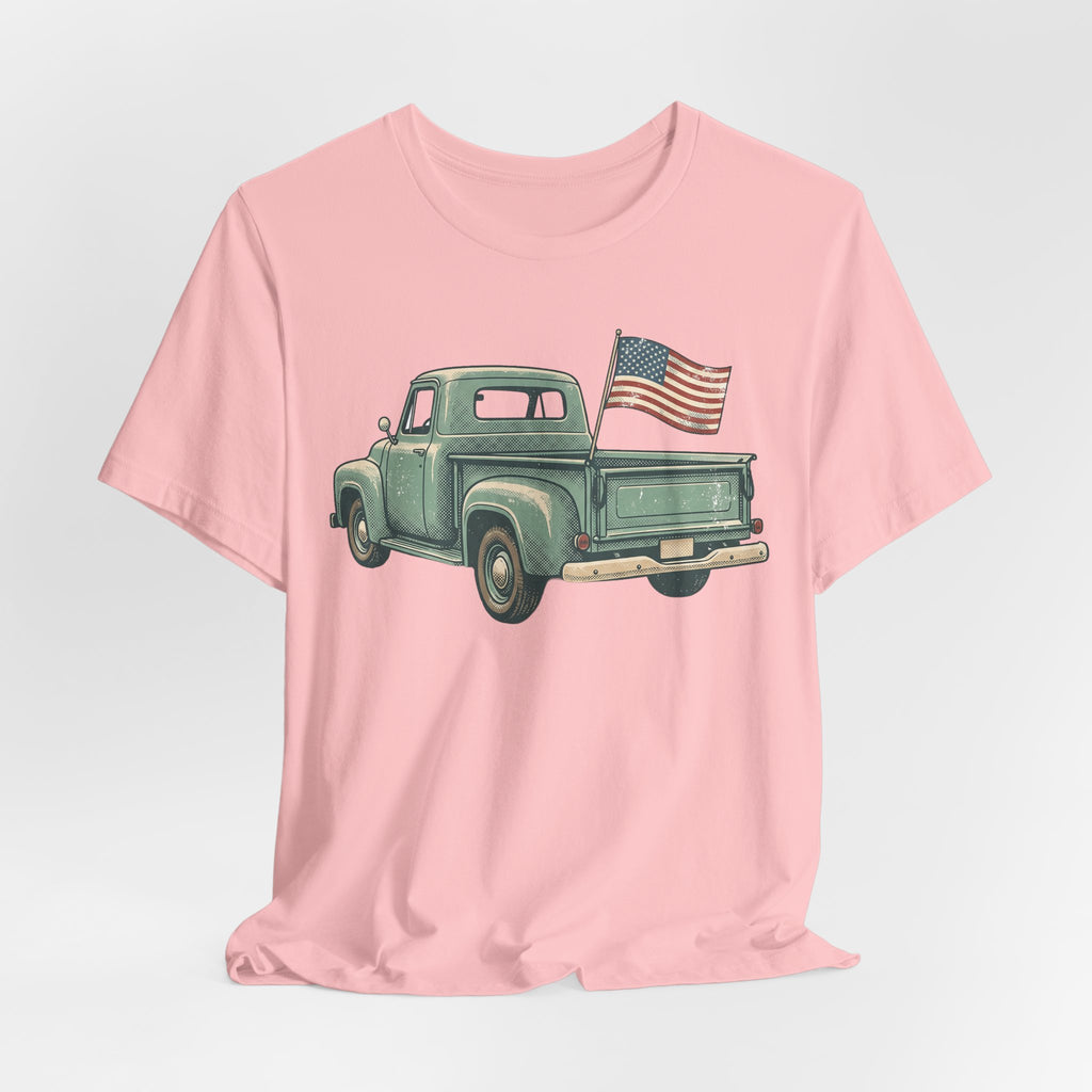 Light pink T-shirt with green pickup truck and American flag graphic