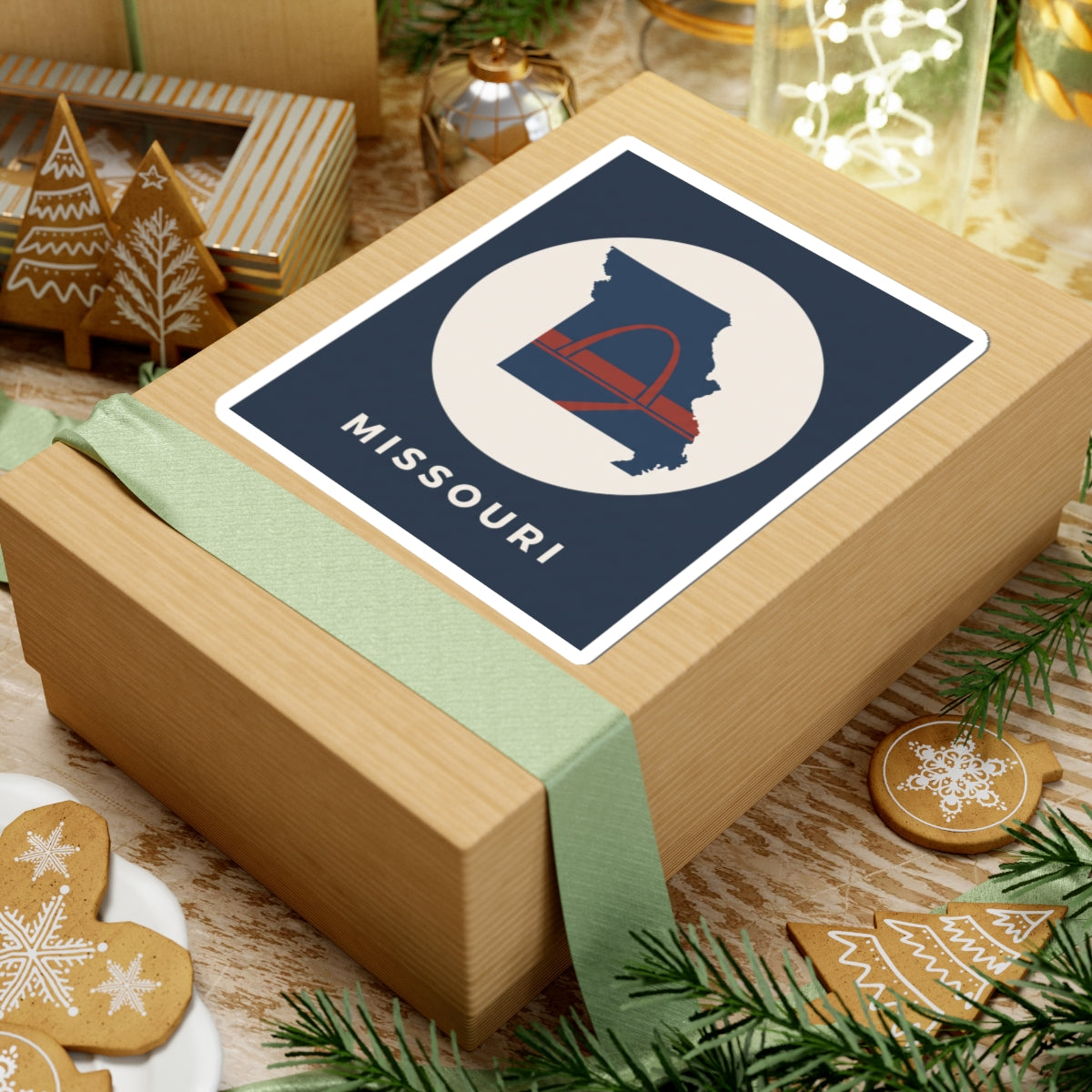 Missouri square sticker featuring state outline, arch graphic, and MISSOURI text on a gift