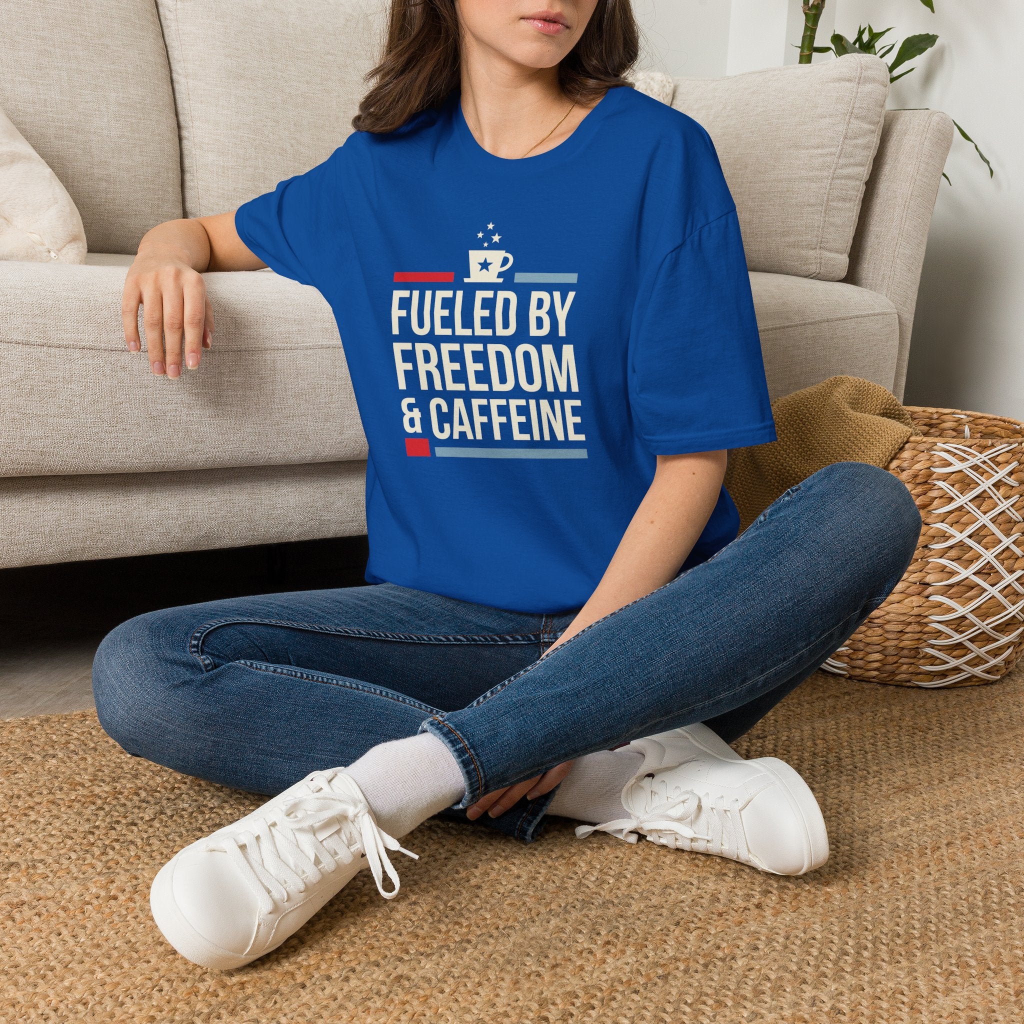 Royal blue crew-neck t-shirt with colorful "Fueled by Freedom & Caffeine" chest graphic