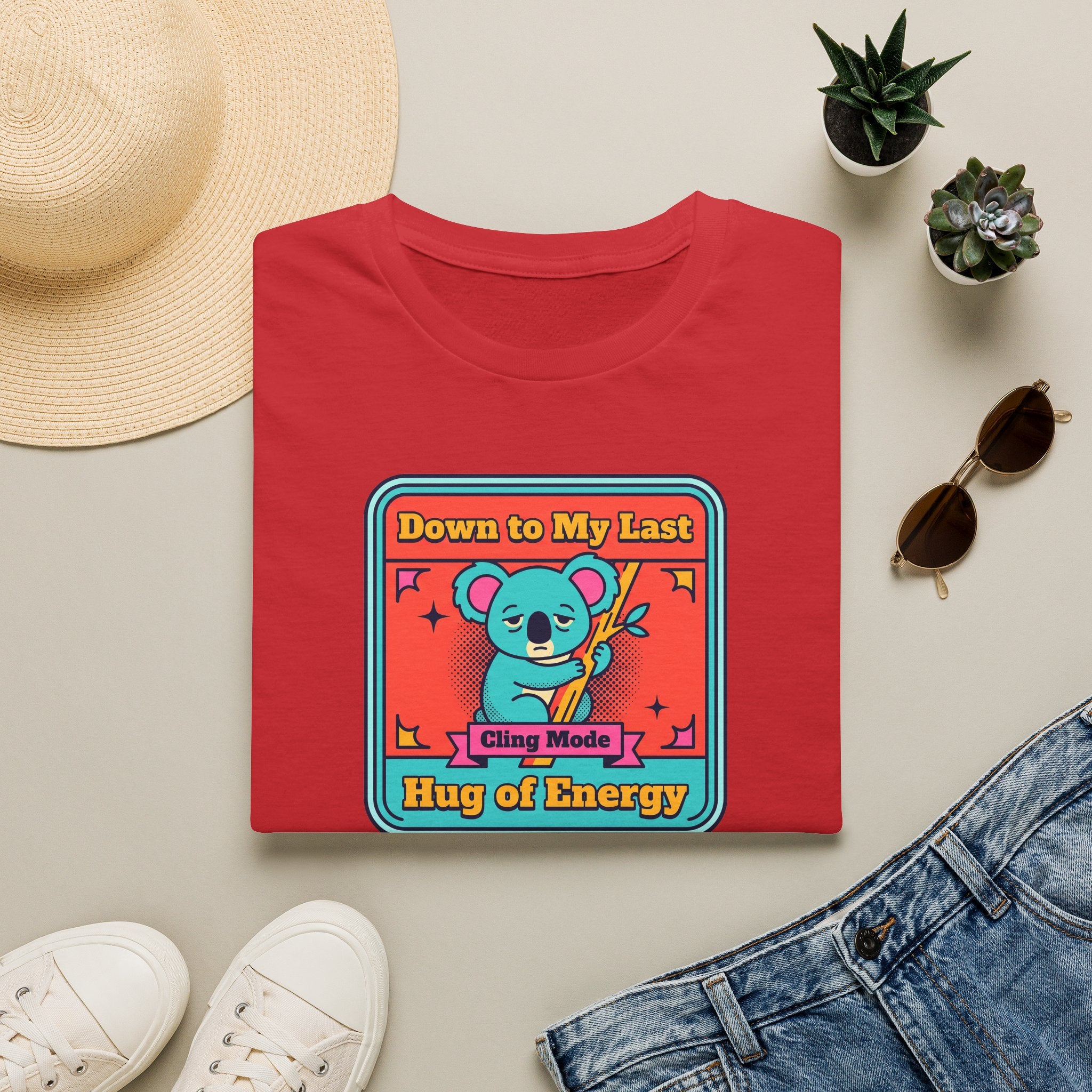 Red koala graphic t-shirt with colorful badge-style front print