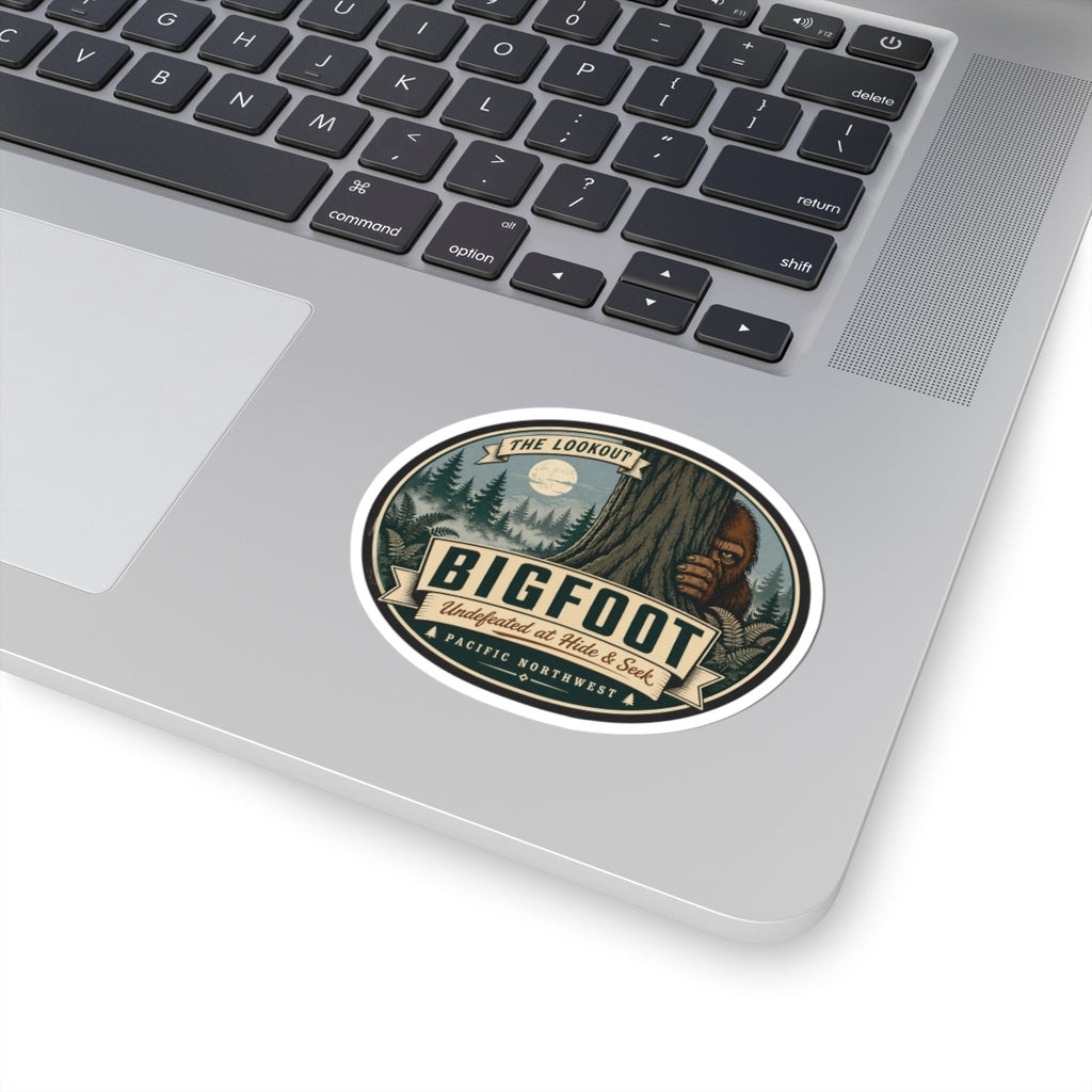 Round kiss-cut Bigfoot outdoor logo vinyl sticker on laptop surface