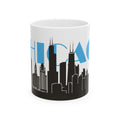 White ceramic mug with black Chicago skyline and blue skyline design