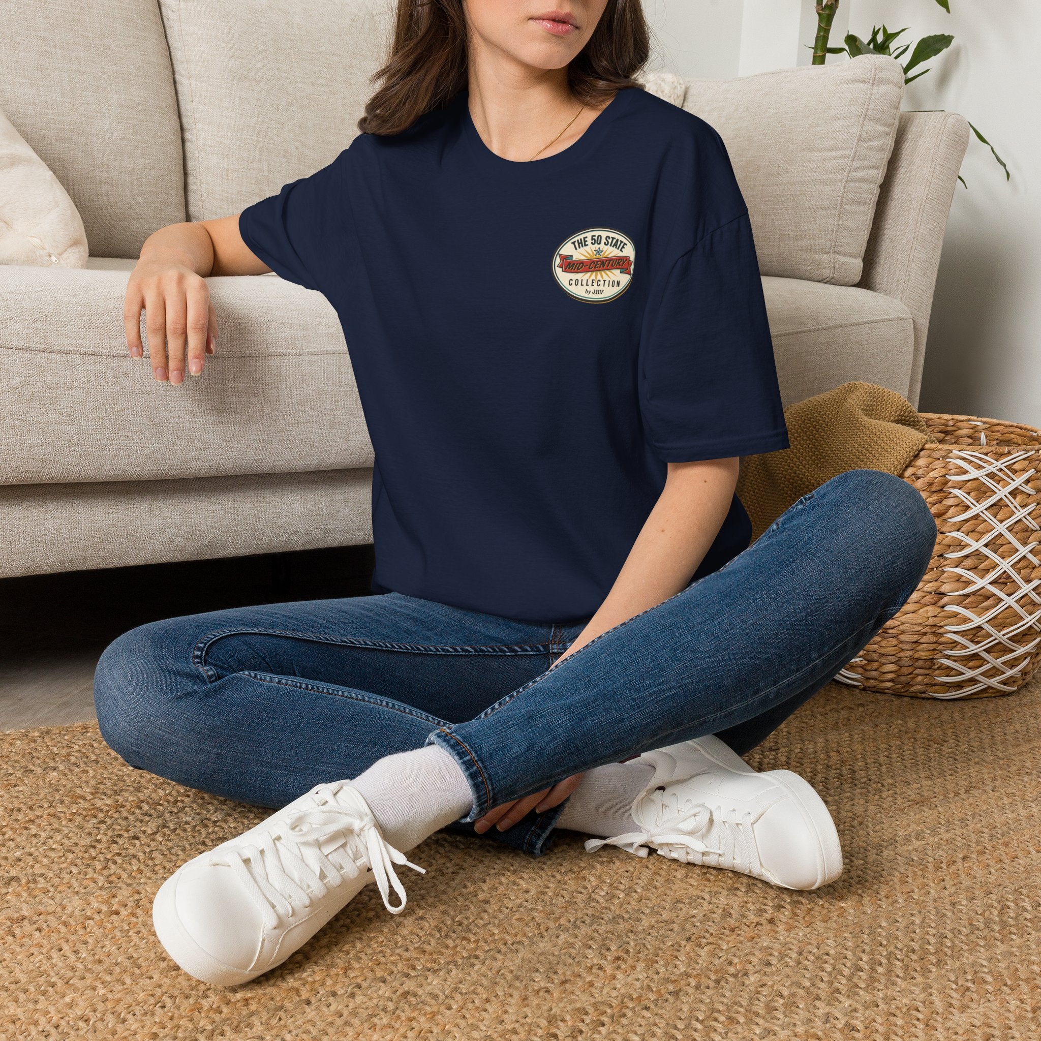 Navy T-shirt with chest logo patch worn by model