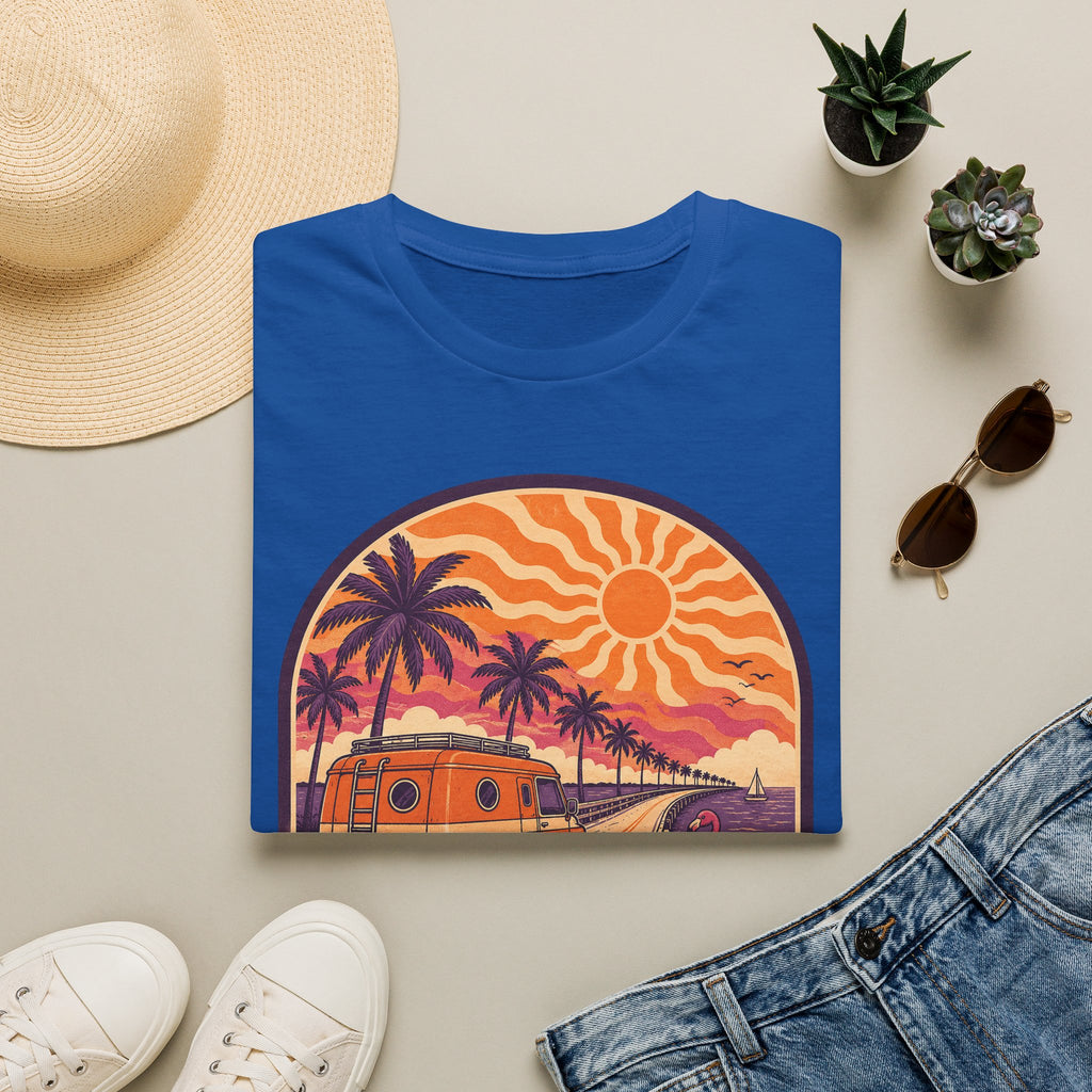 Unisex T-shirt in royal blue with retro orange van and palm sunset graphic on front.
