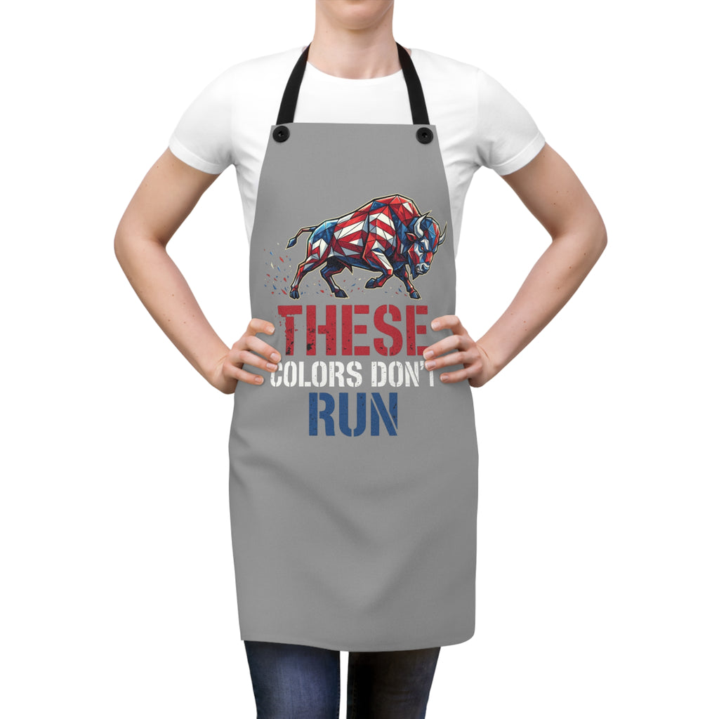 Gray apron with black straps; colorful bull and text “THESE COLORS DON’T RUN”