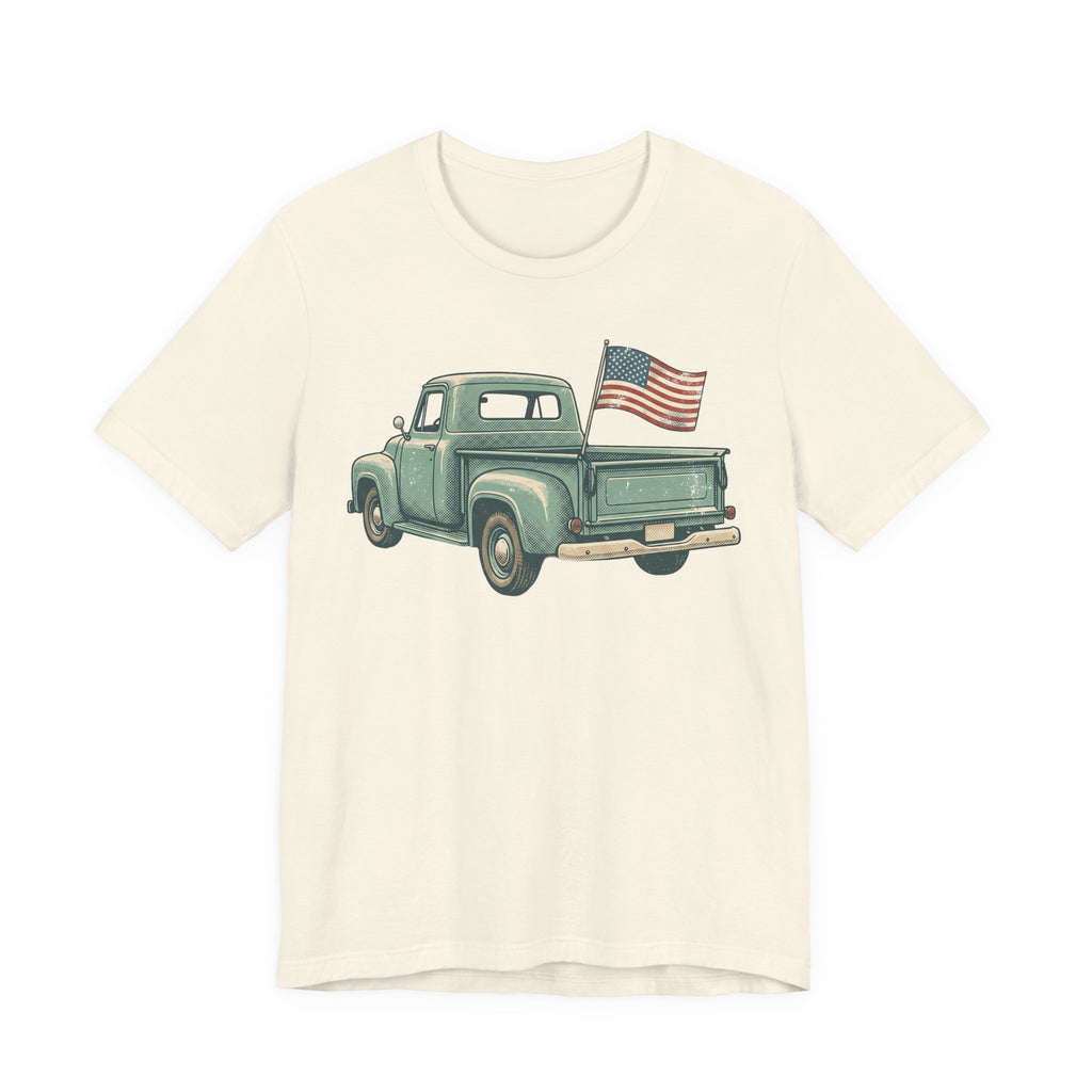 Cream T-shirt with green pickup truck and American flag graphic