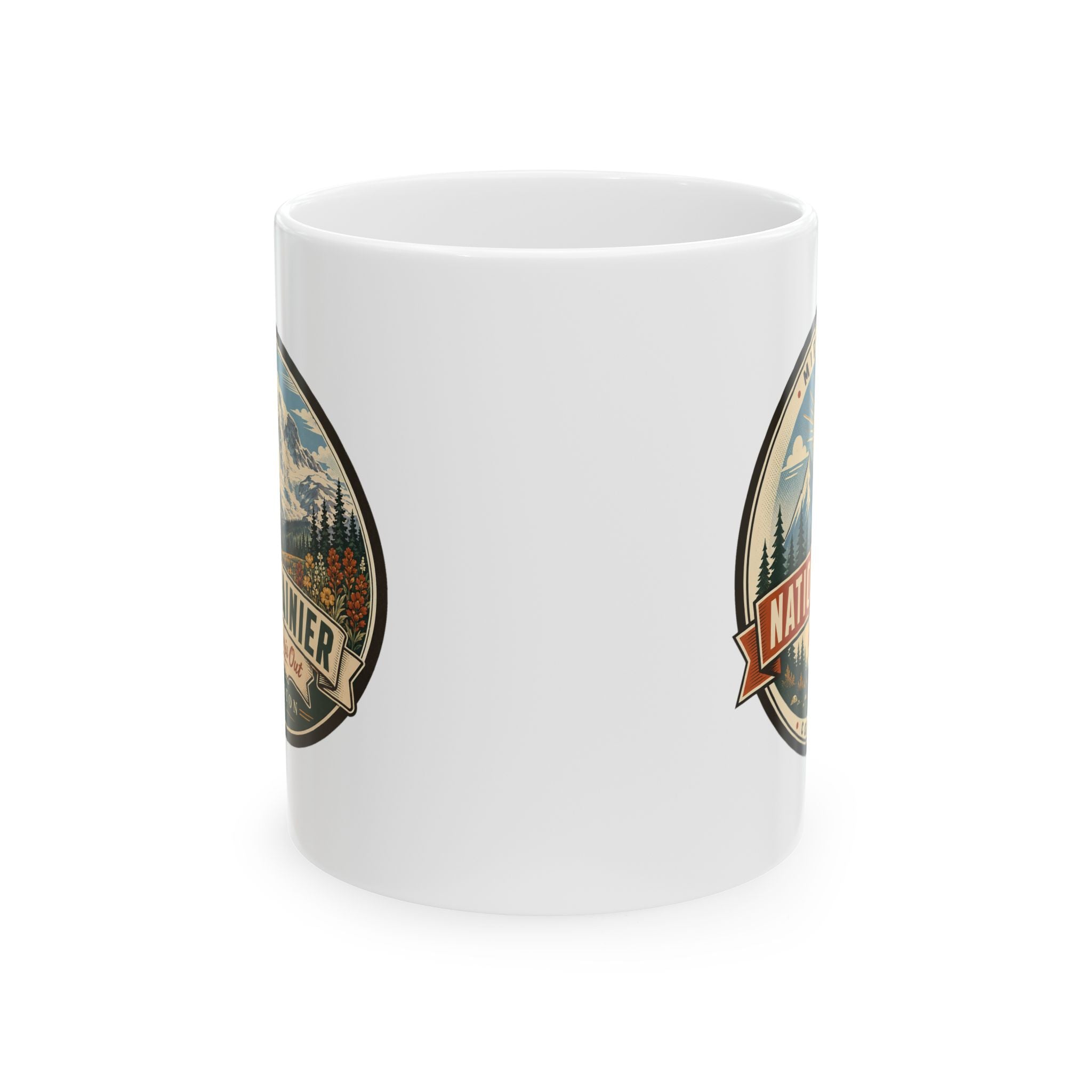 White ceramic mug with retro Mount Rainier emblem graphic on the side