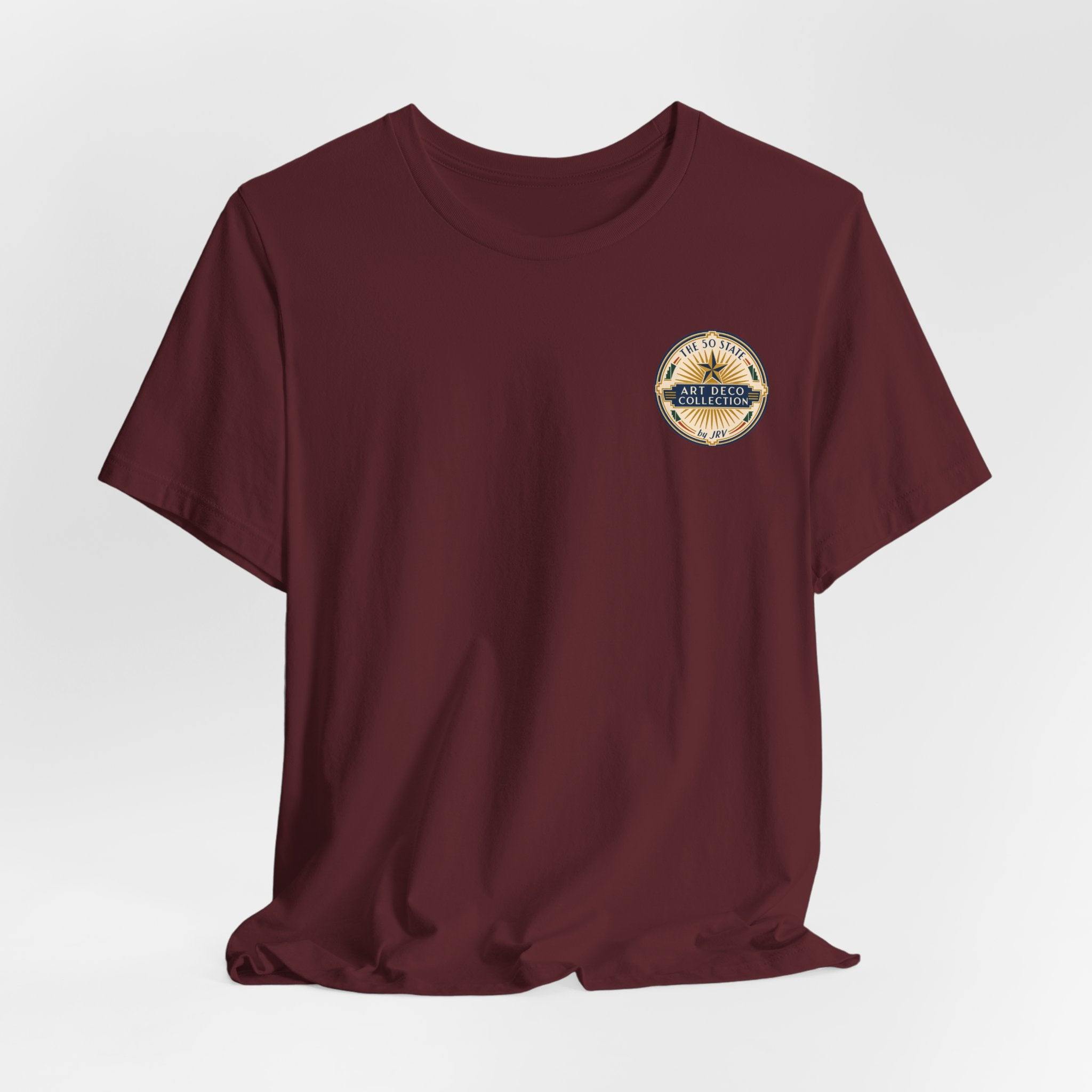 Maroon t-shirt with small round art deco collection logo at upper right chest