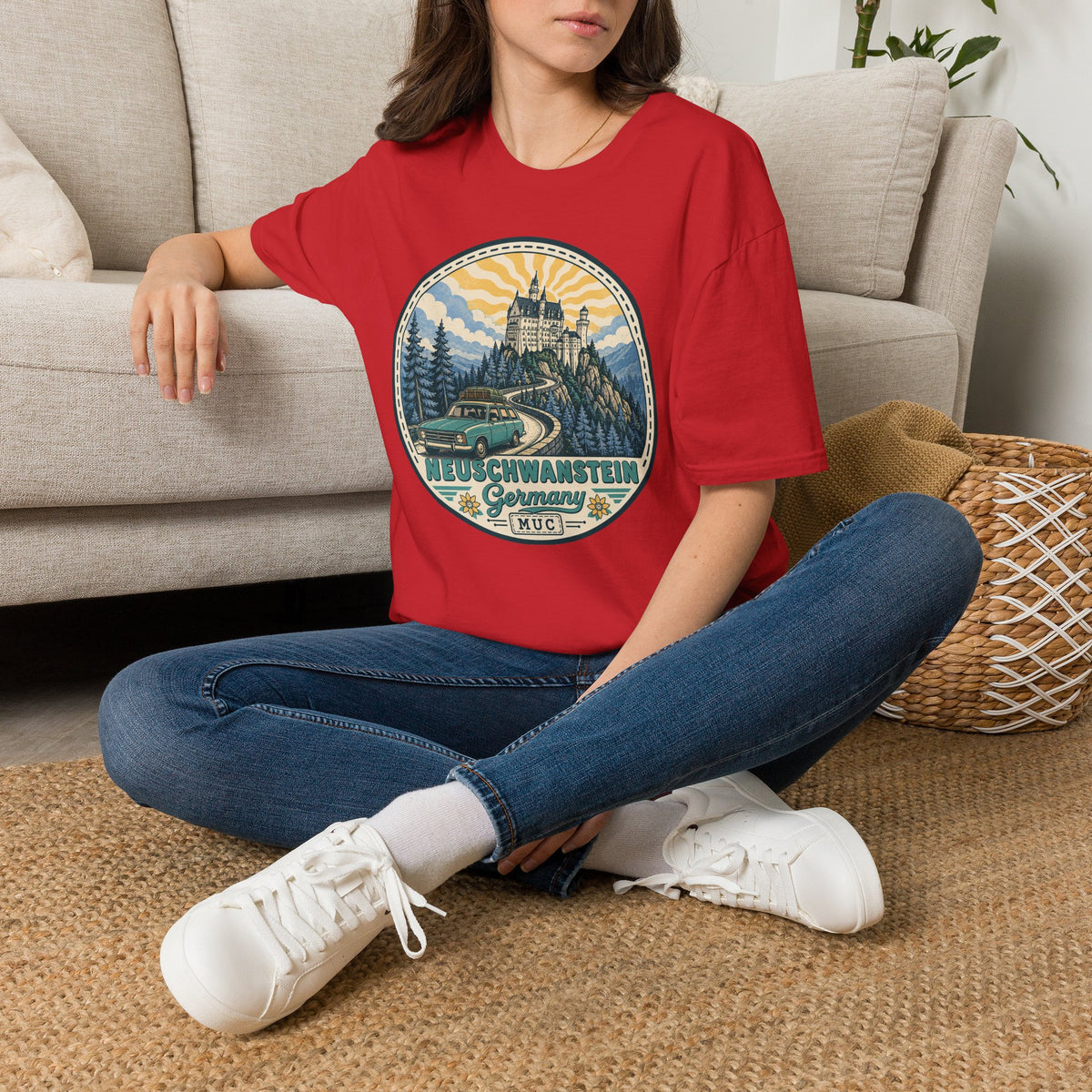 Red crew-neck short-sleeve T-shirt with circular castle graphic