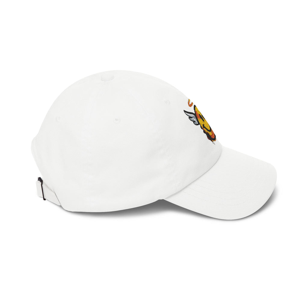 White dad cap angled side view with winged smiley embroidery