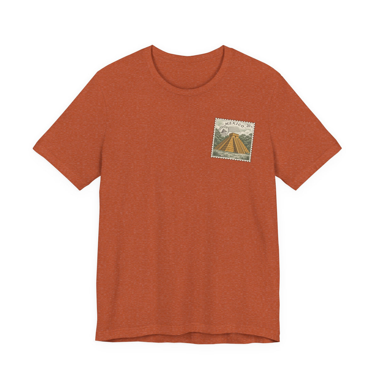 Rust orange t-shirt with small vintage-style Mexico stamp graphic at upper chest