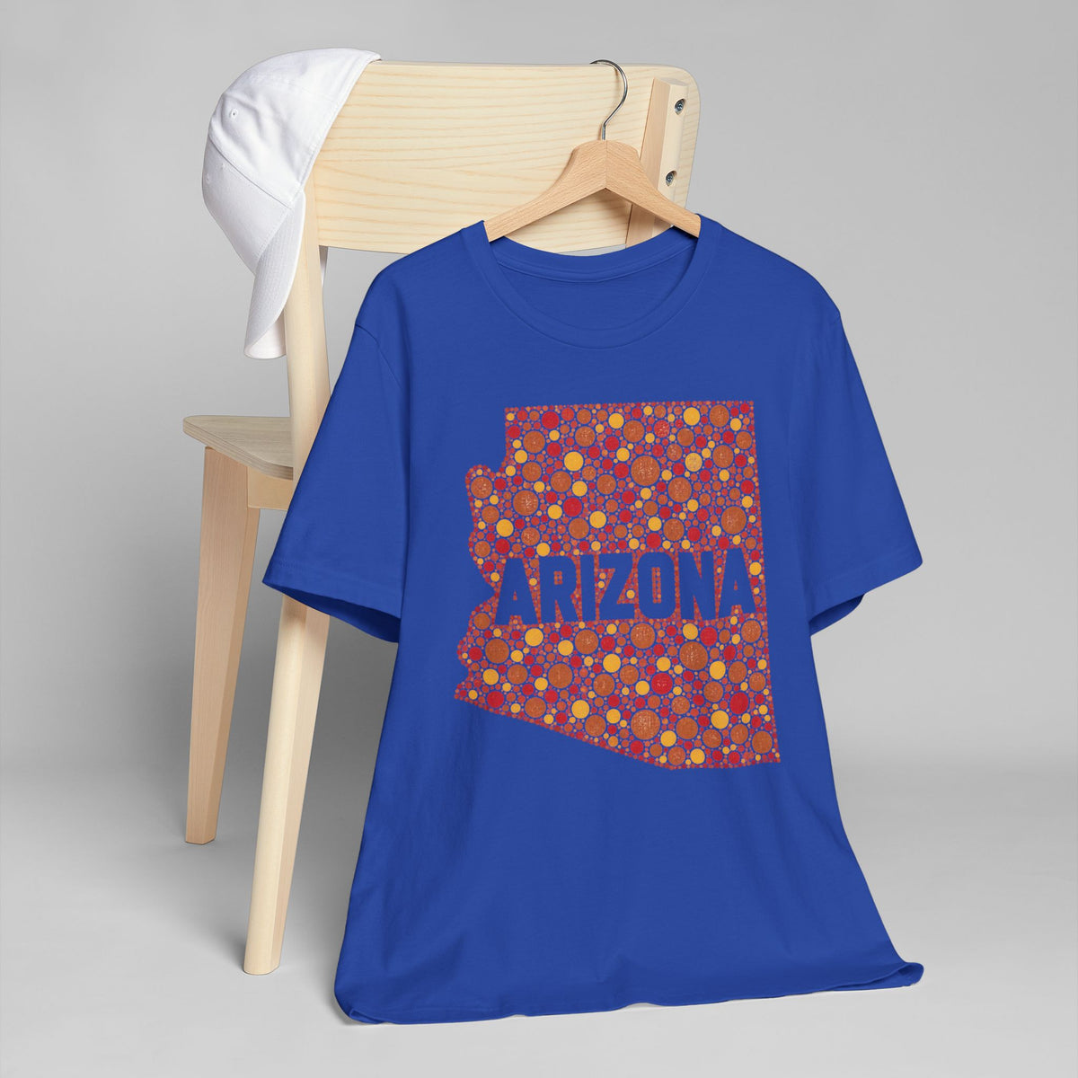 Royal blue crewneck T-shirt with red and orange patterned Arizona graphic on front