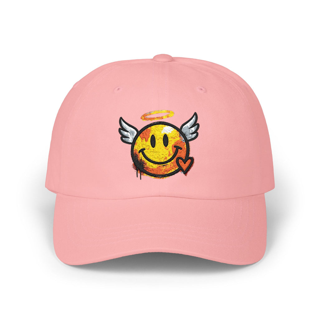 Pink dad cap with embroidered winged smiley and halo on the front