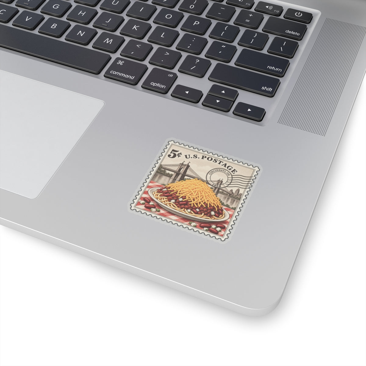 Cincinnati chili postage stamp vinyl sticker on silver laptop lid