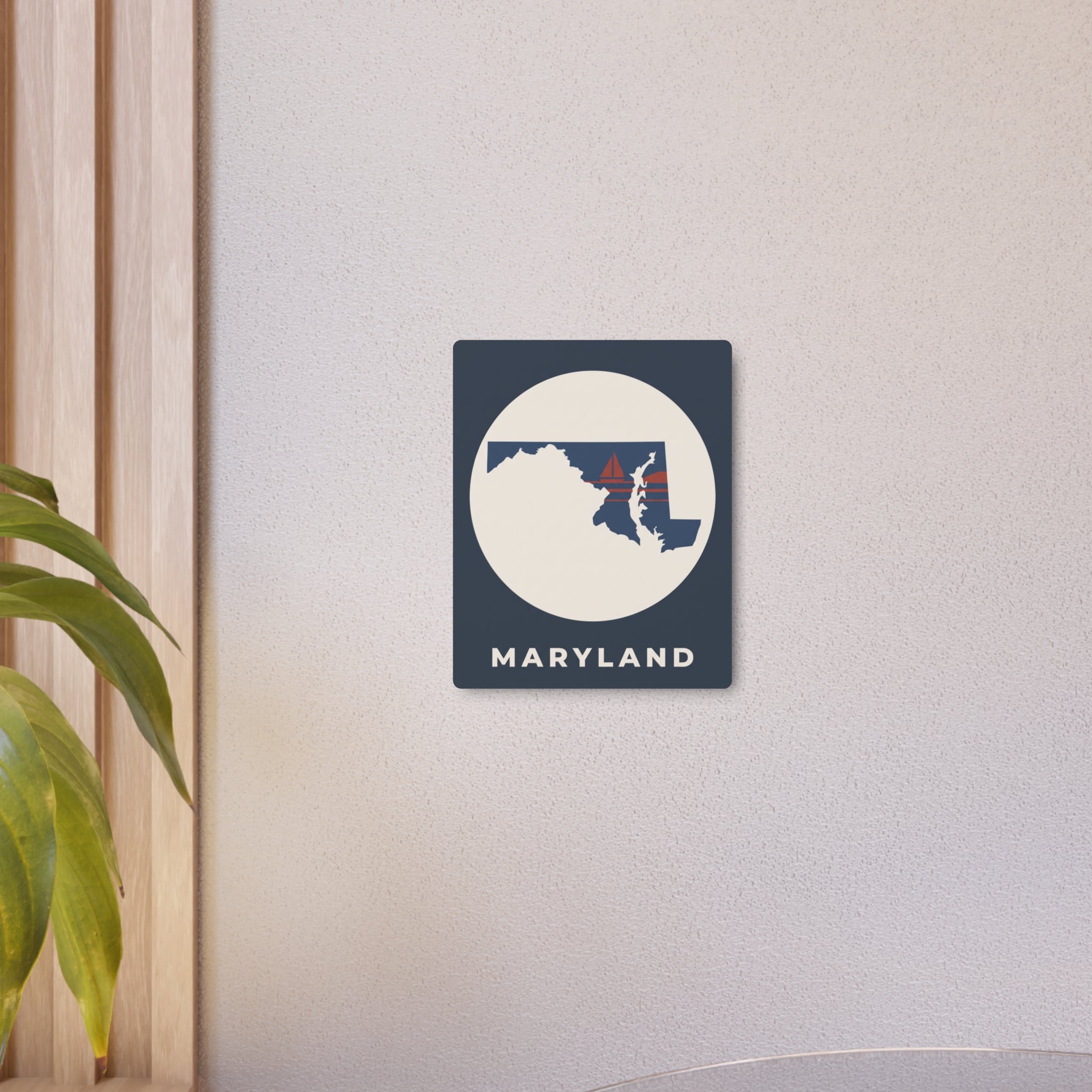 Small Maryland metal wall sign with circular state map and nautical flag details