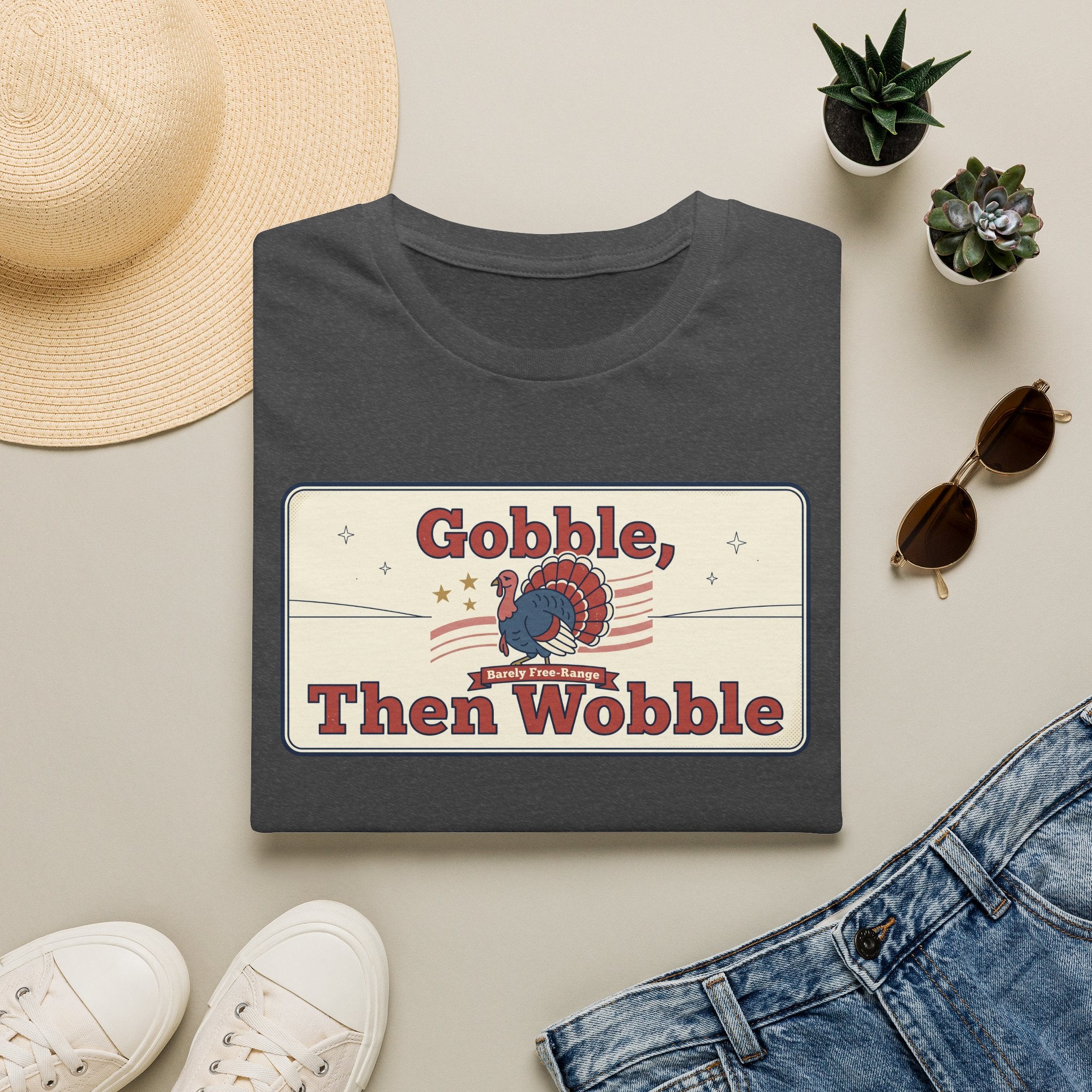 Charcoal T-shirt with retro turkey graphic and bold “Gobble, Then Wobble” text