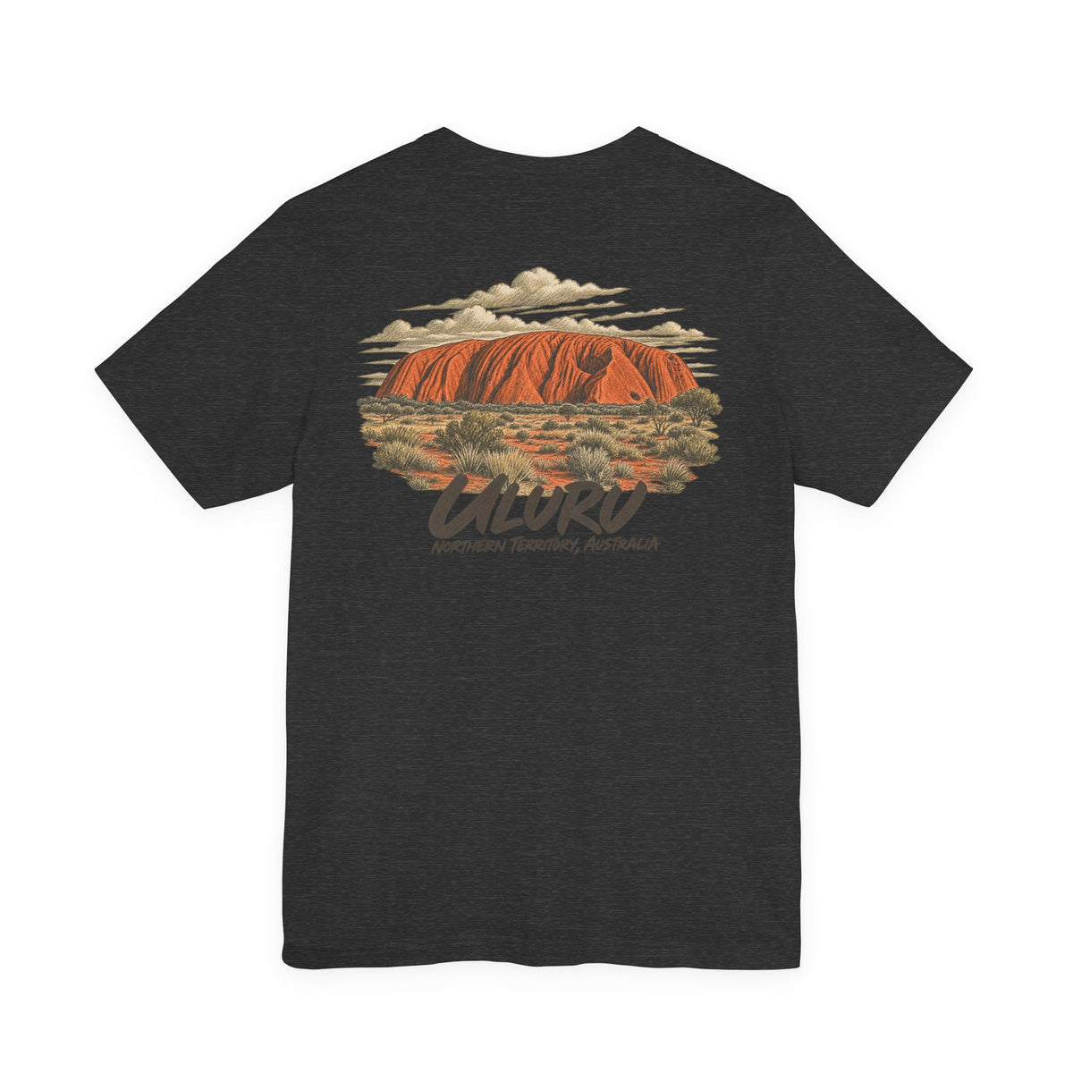 Black travel T-shirt with large Uluru landscape graphic centered on the back