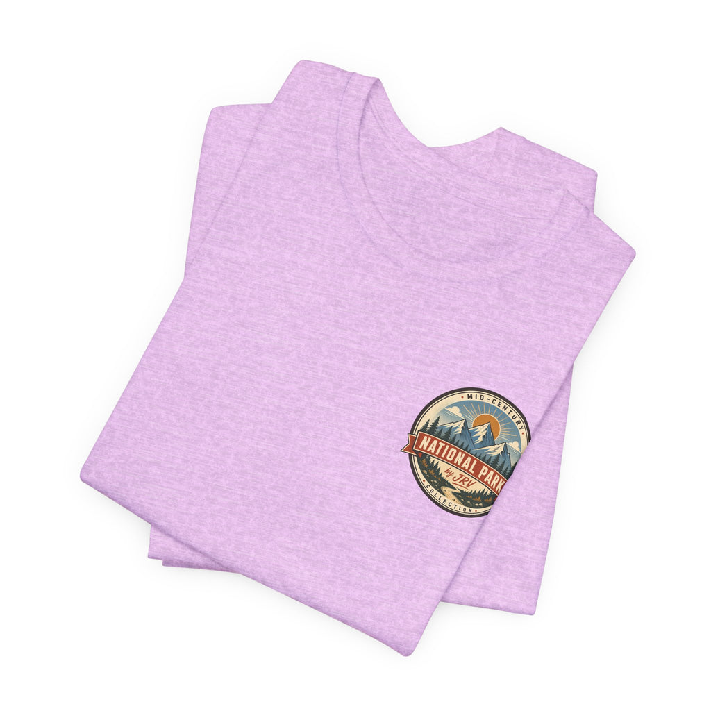 Light purple T-shirt stack with small National Park badge graphic on chest