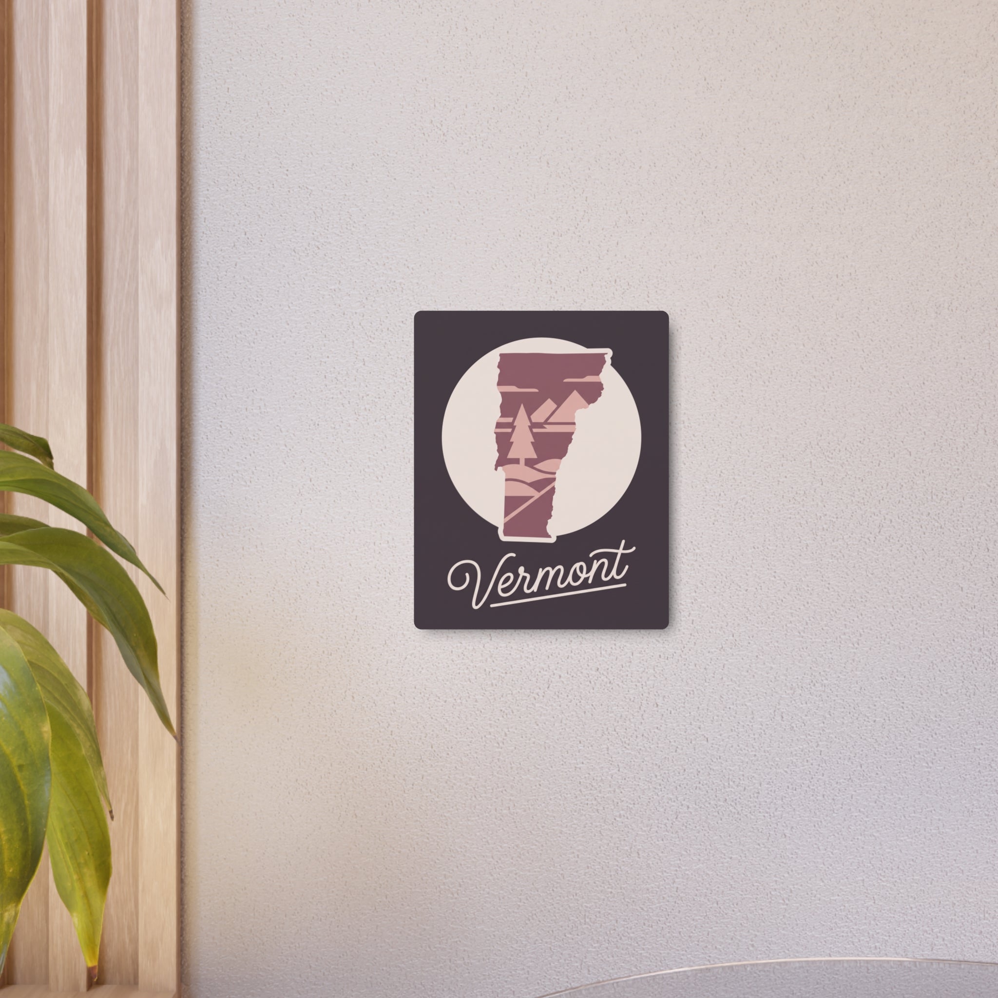 Square Vermont metal wall art with mauve state silhouette and white “Vermont” text