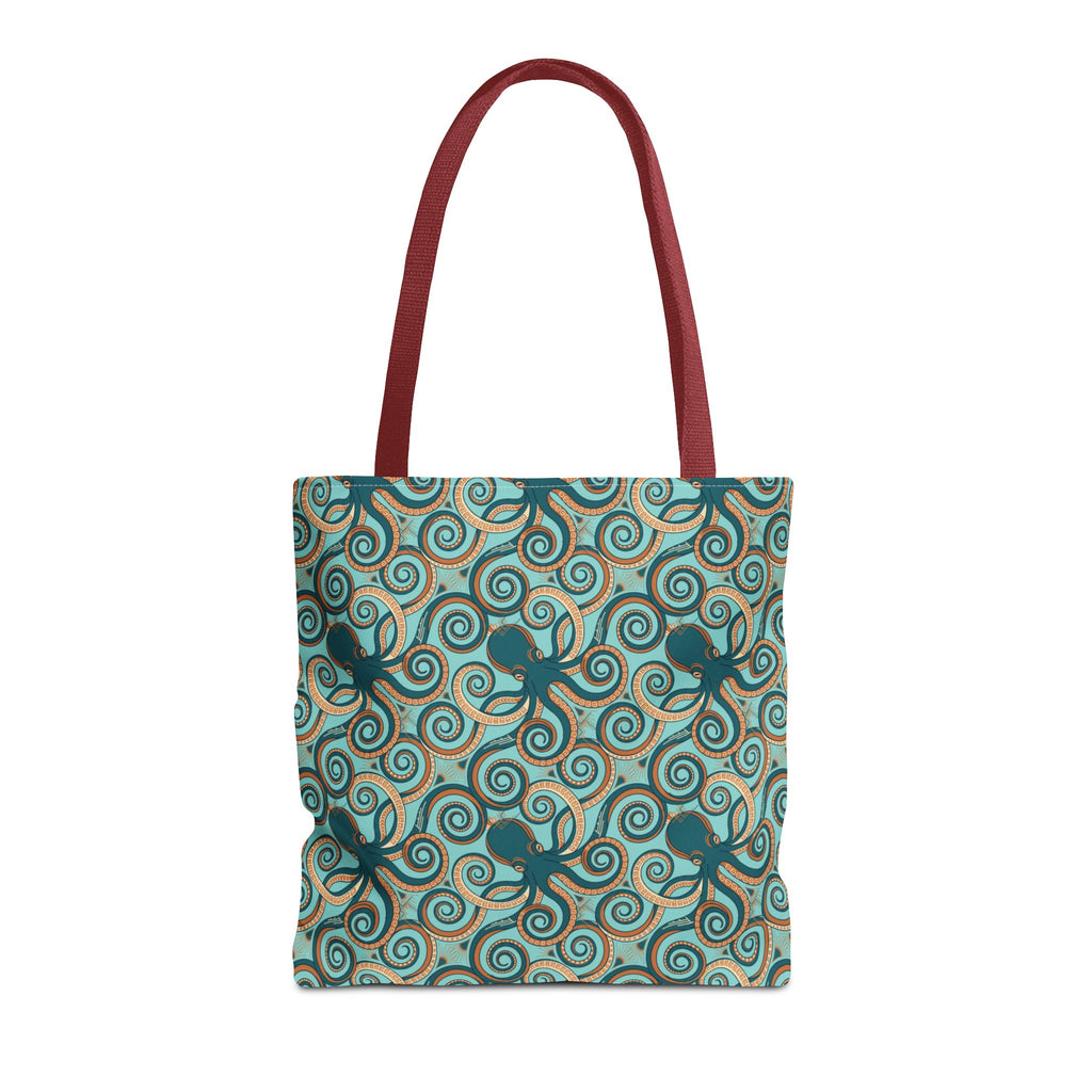 Teal tote bag with all-over octopus swirl pattern and red handles