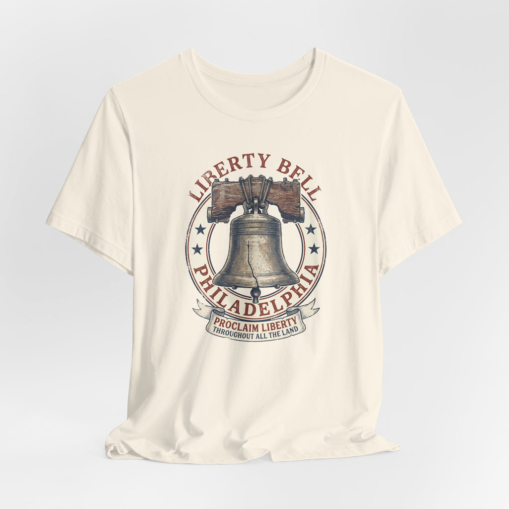 Cream crewneck T-shirt with centered Liberty Bell and text graphic