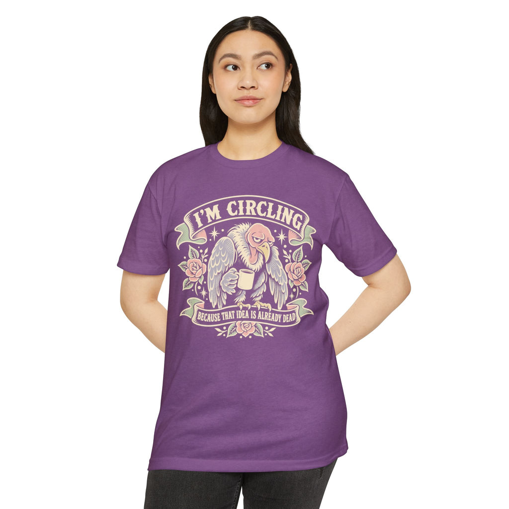 Purple graphic tee with vulture artwork and 'I'm Circling' slogan on chest