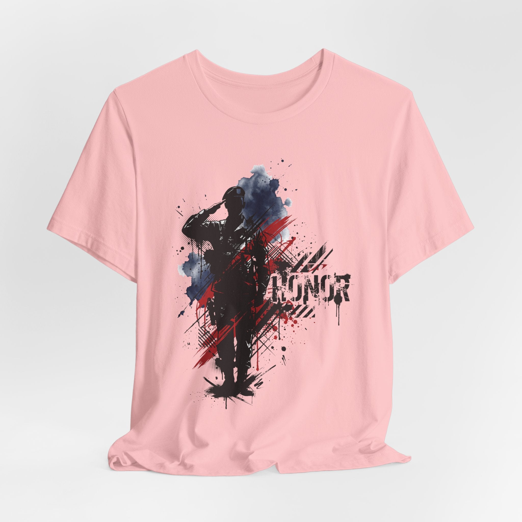 Pink crewneck T-shirt with soldier silhouette splatter graphic on chest.