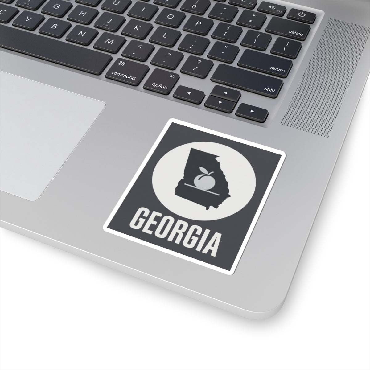 Square vinyl sticker with white border showing Georgia text and state silhouette peach icon.