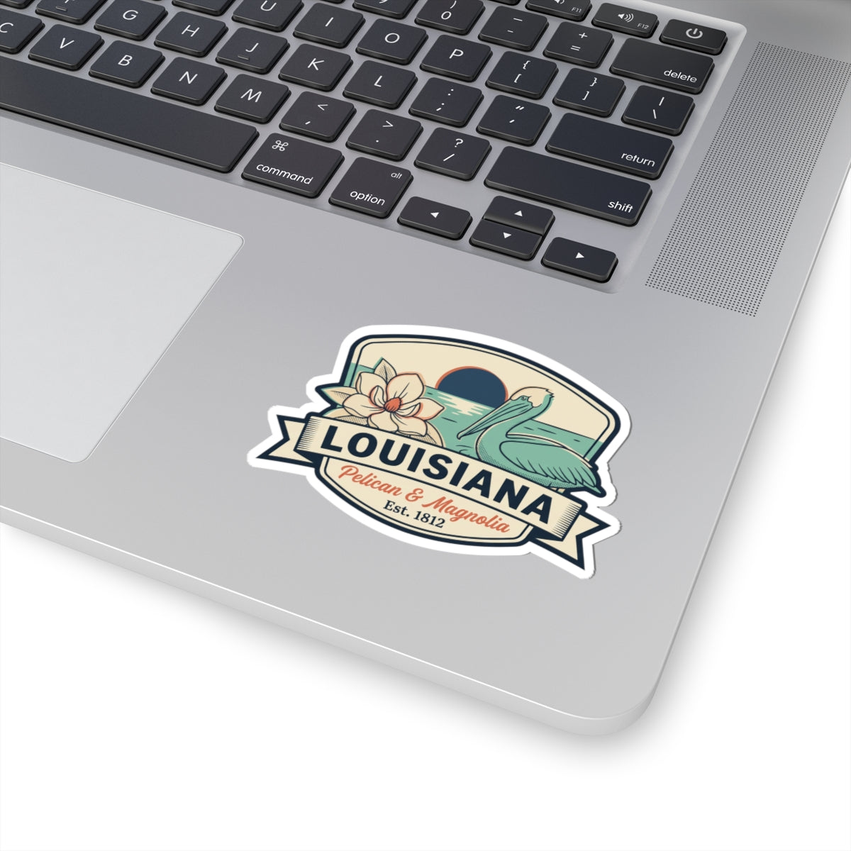Louisiana pelican and magnolia sticker decal showing ribbon banner and “Est. 1812” text.