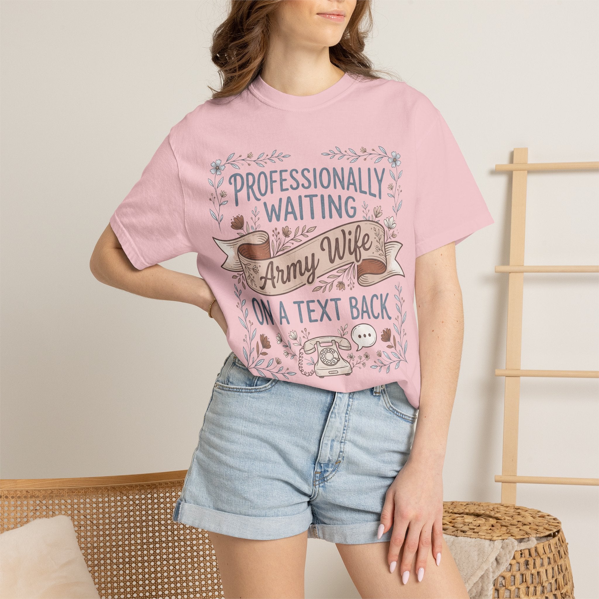 Light pink crewneck T-shirt with floral 'Professionally Waiting' and 'A Text Back' text.