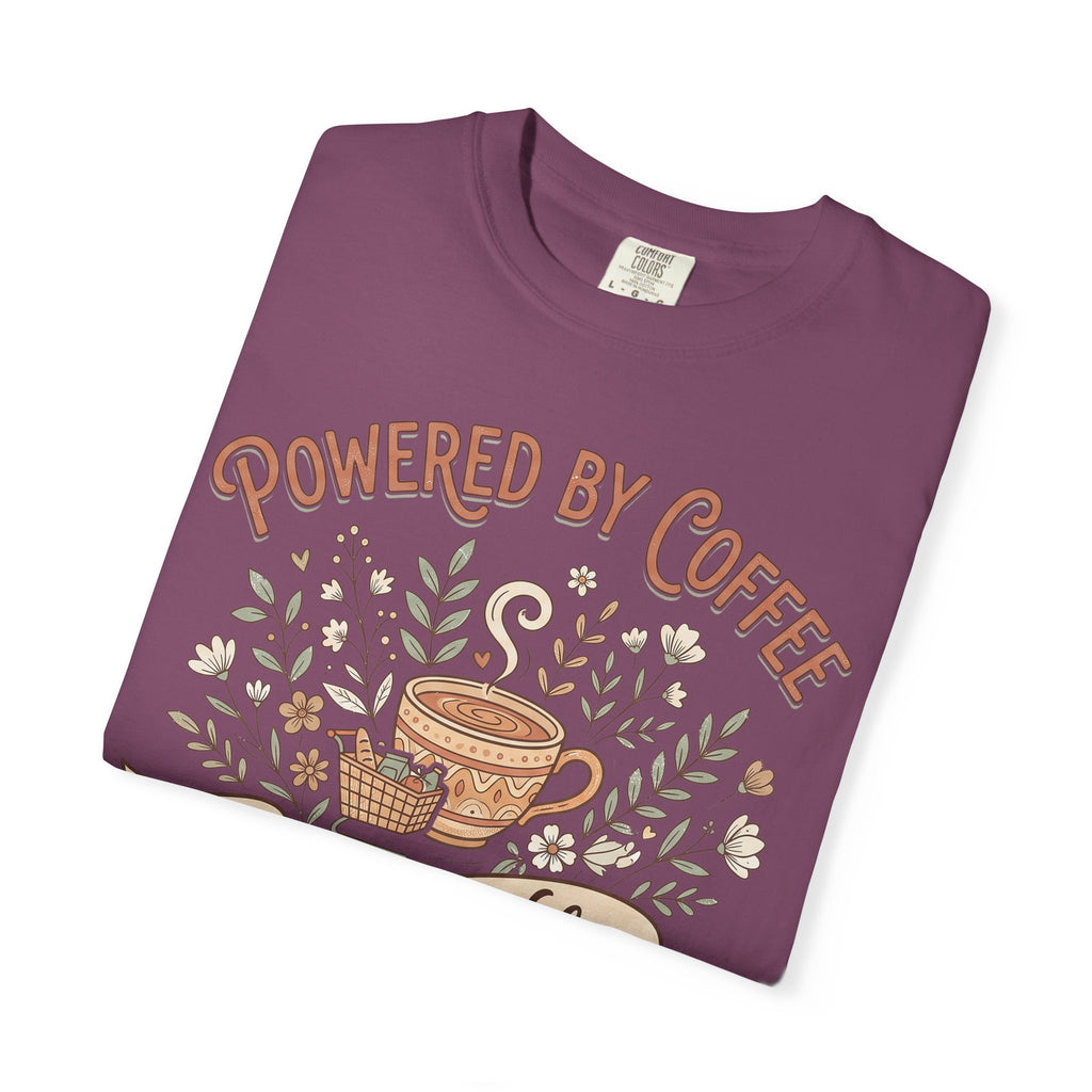 Purple short-sleeve T-shirt with 'Powered by Coffee' floral graphic