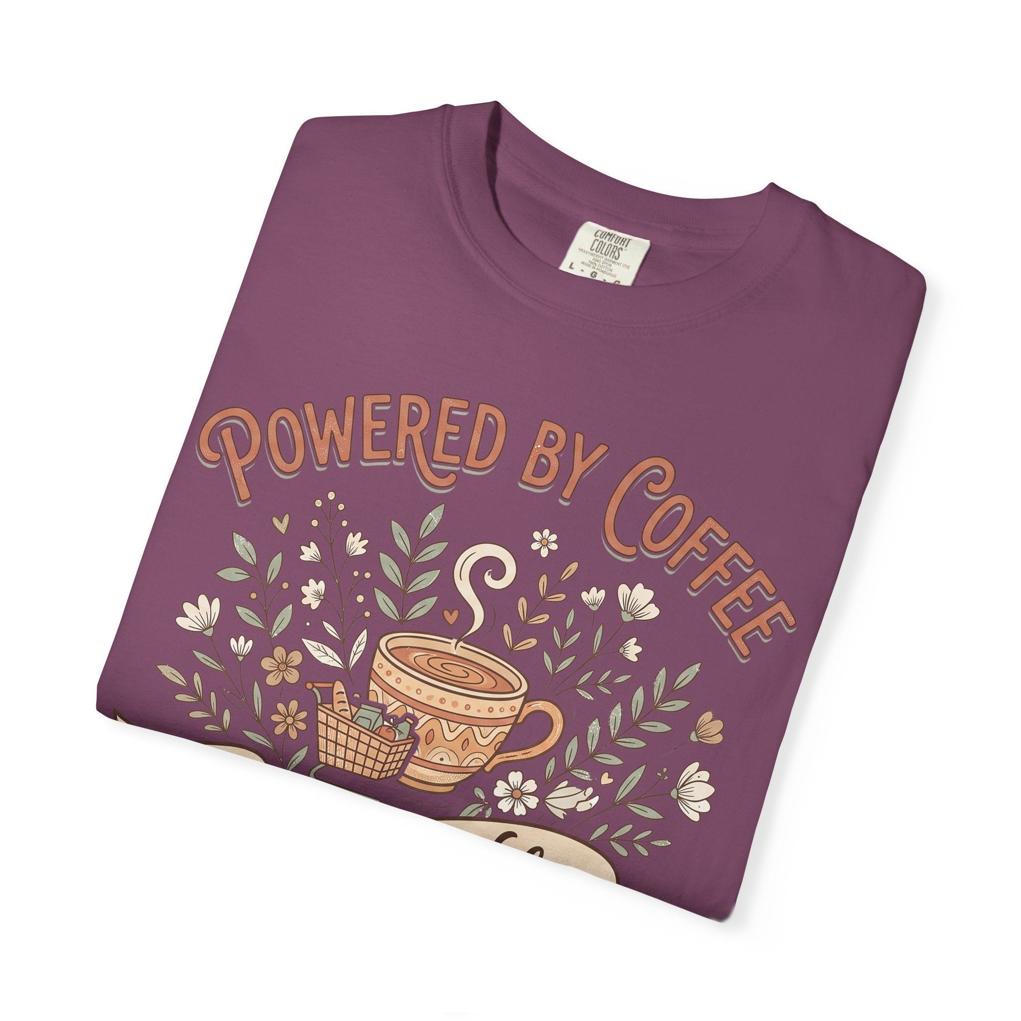 Purple short-sleeve T-shirt with 'Powered by Coffee' floral graphic