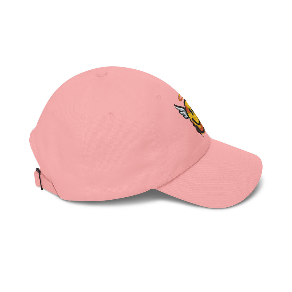Pink cap side view, winged smiley embroidery and adjustable back strap