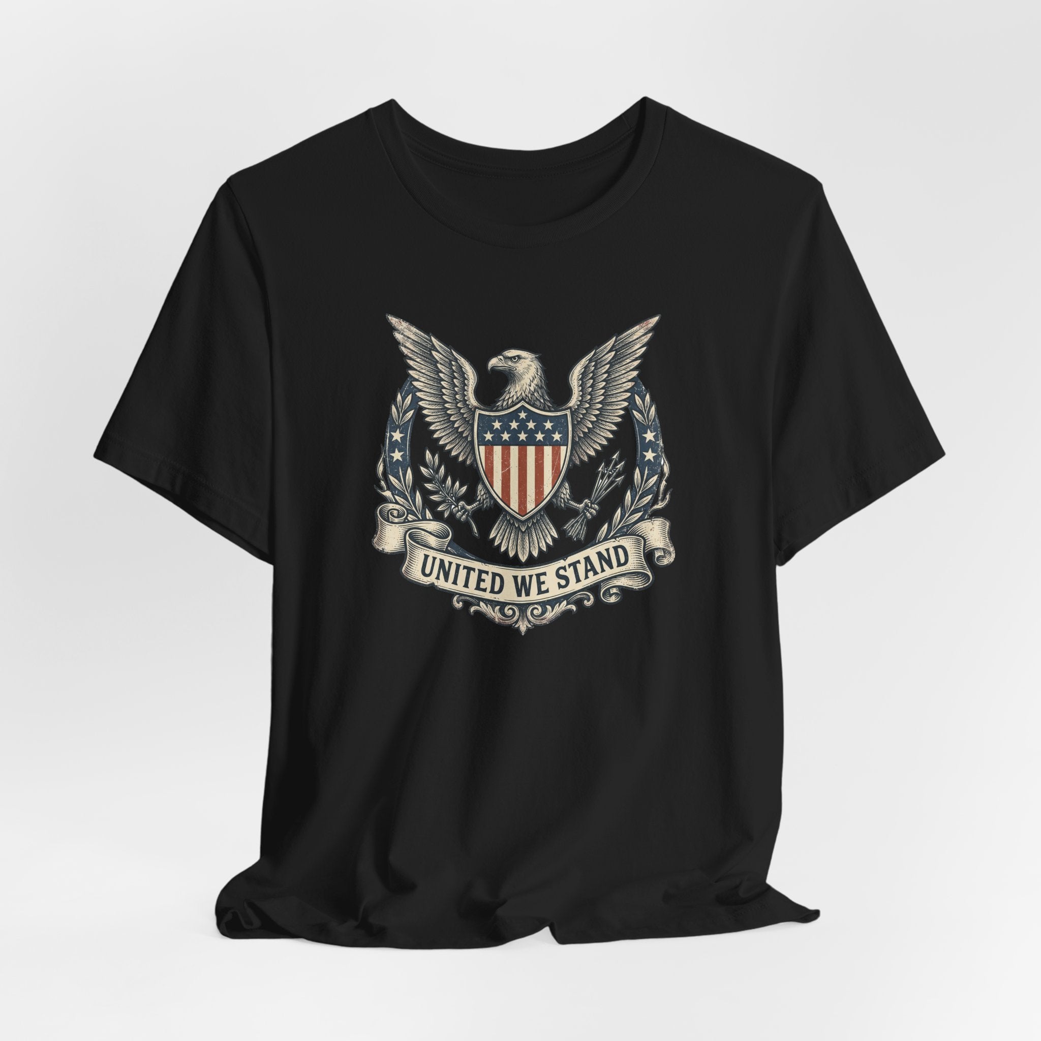 Black T-shirt with eagle shield crest and laurel graphic centered on the chest