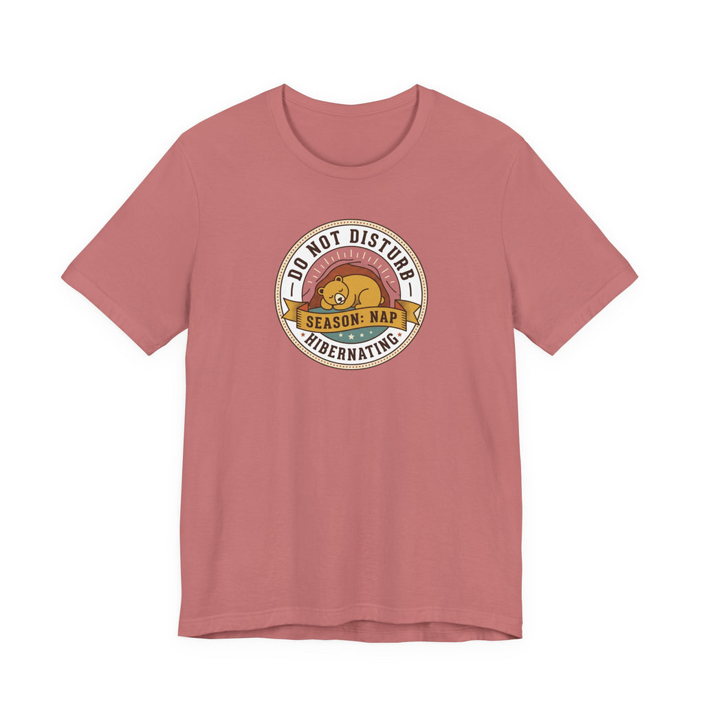 Dusty rose T-shirt with hibernating bear "Do Not Disturb" circular graphic on chest