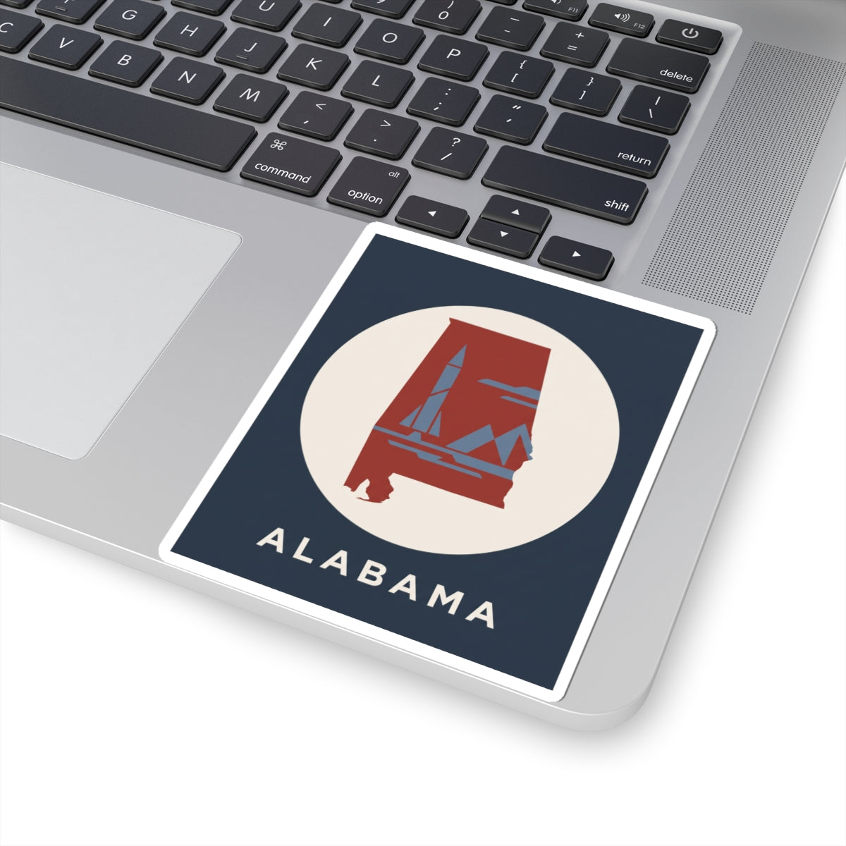 Square white-bordered Alabama sticker with red landmark graphic, white circle on navy
