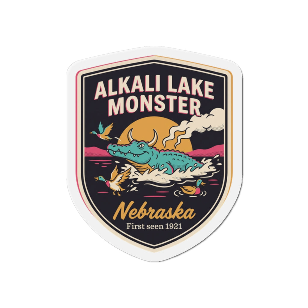 Shield-shaped die-cut magnet with “Alkali Lake Monster” artwork and “Nebraska” text
