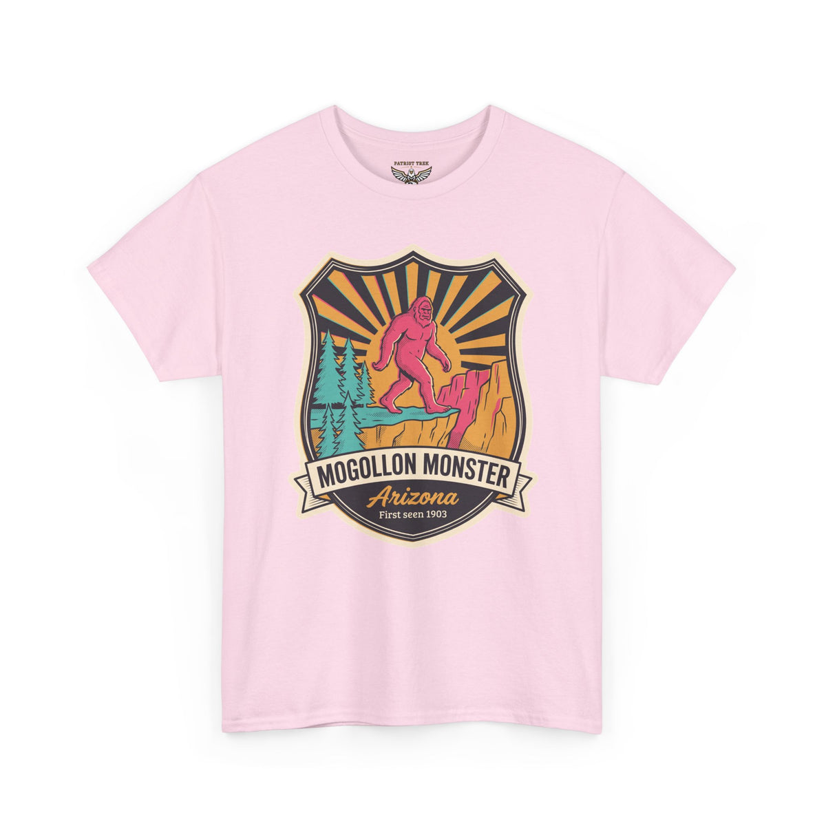 Light pink t-shirt with colorful monster badge graphic on the chest.