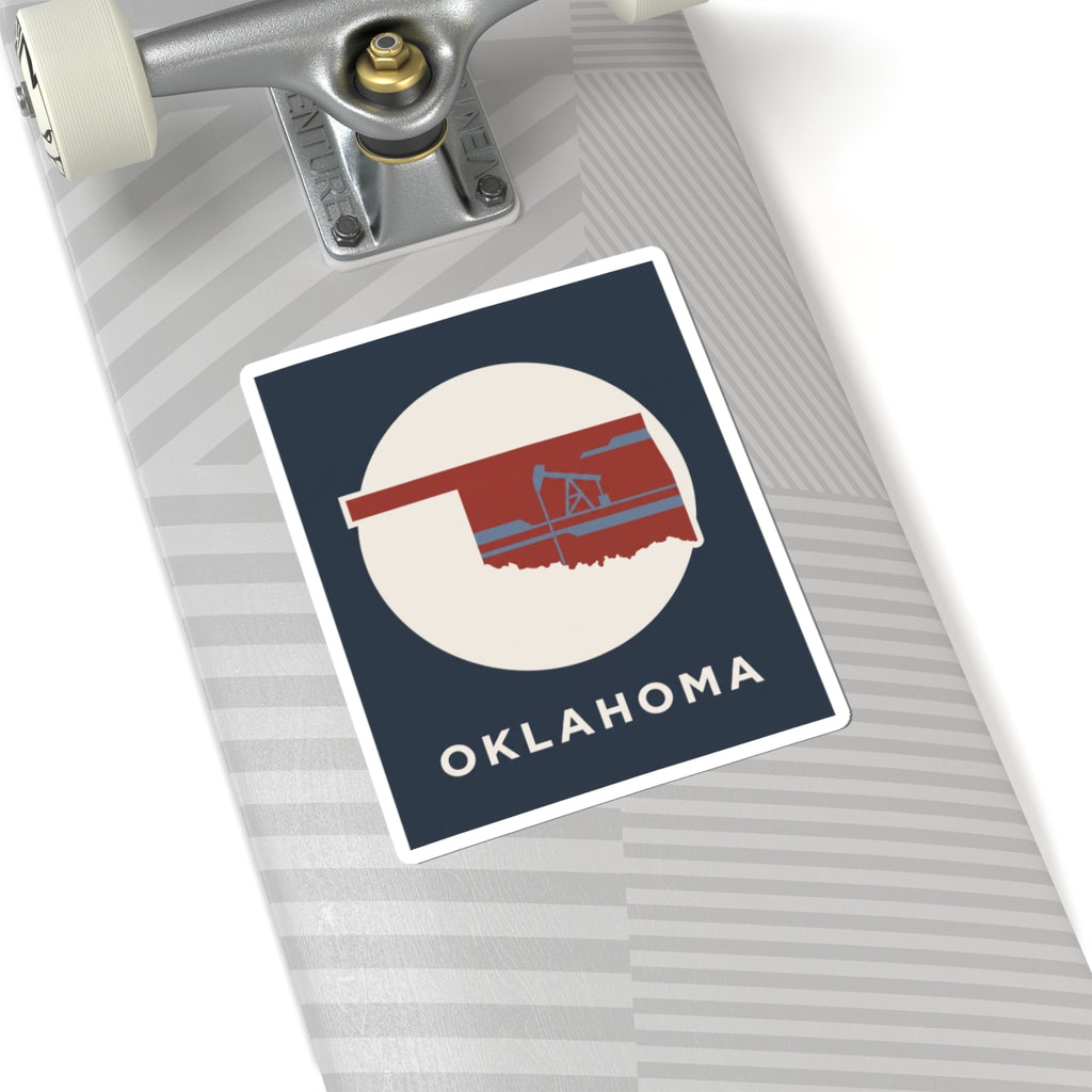 Kiss-cut vinyl Oklahoma sticker on luggage with oil rig graphic and OKLAHOMA text