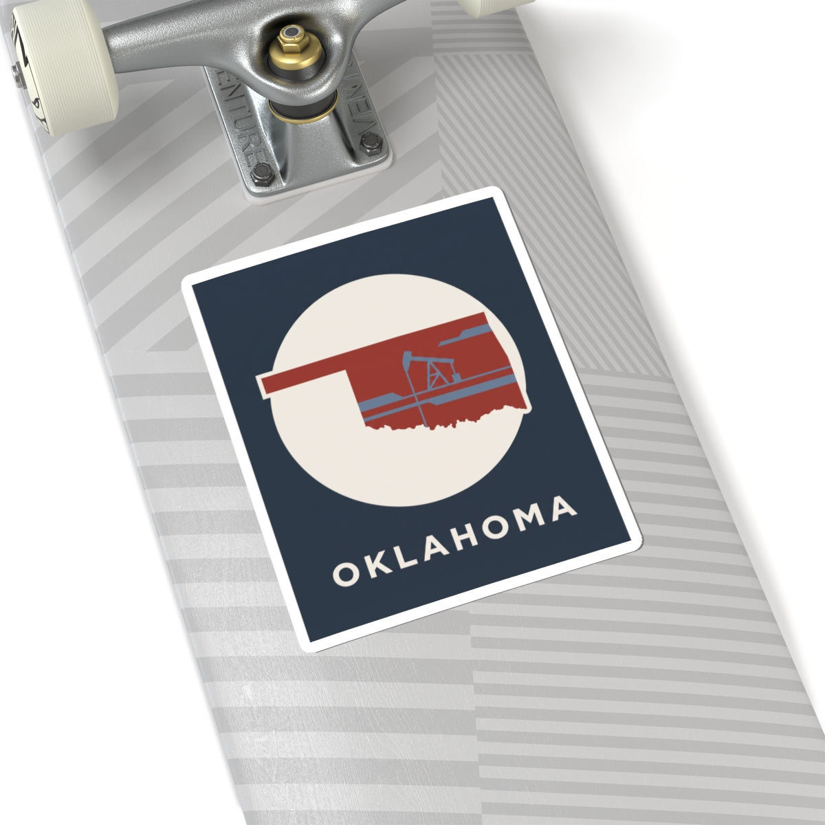 Kiss-cut vinyl Oklahoma sticker on luggage with oil rig graphic and OKLAHOMA text