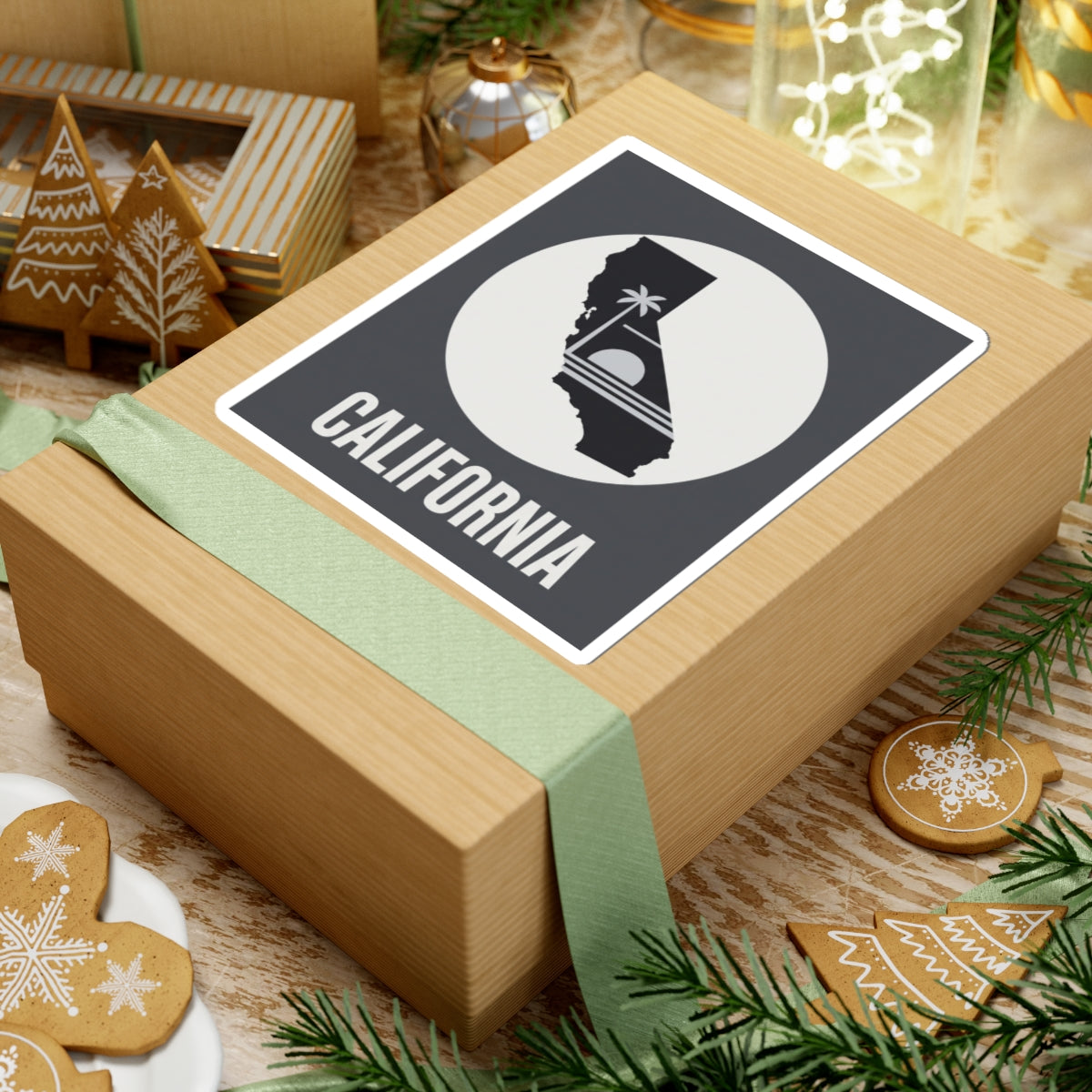 California state silhouette sticker with palm tree icon and CALIFORNIA text on gift box, centered