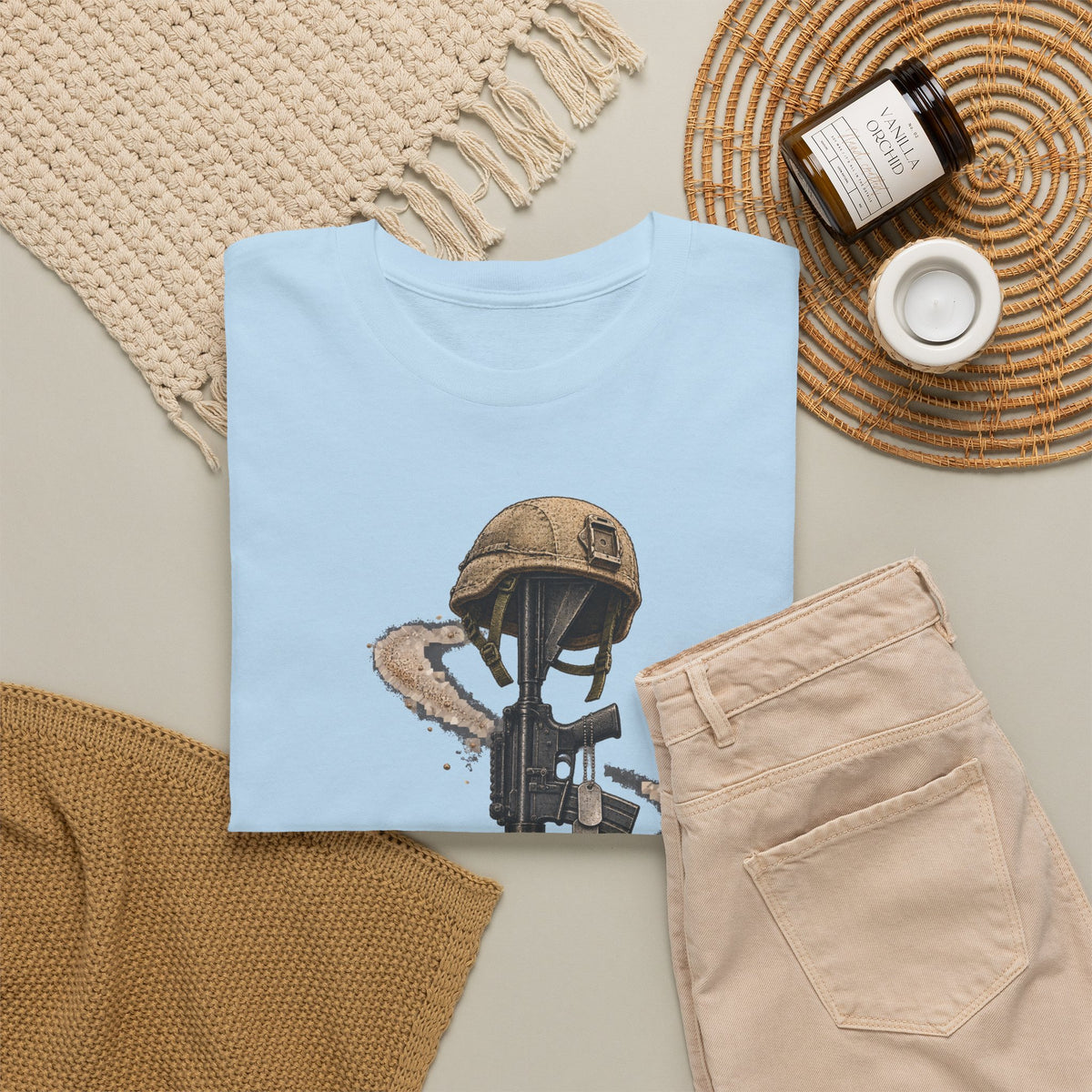 Light blue T-shirt with distressed soldier helmet and rifle graphic on front