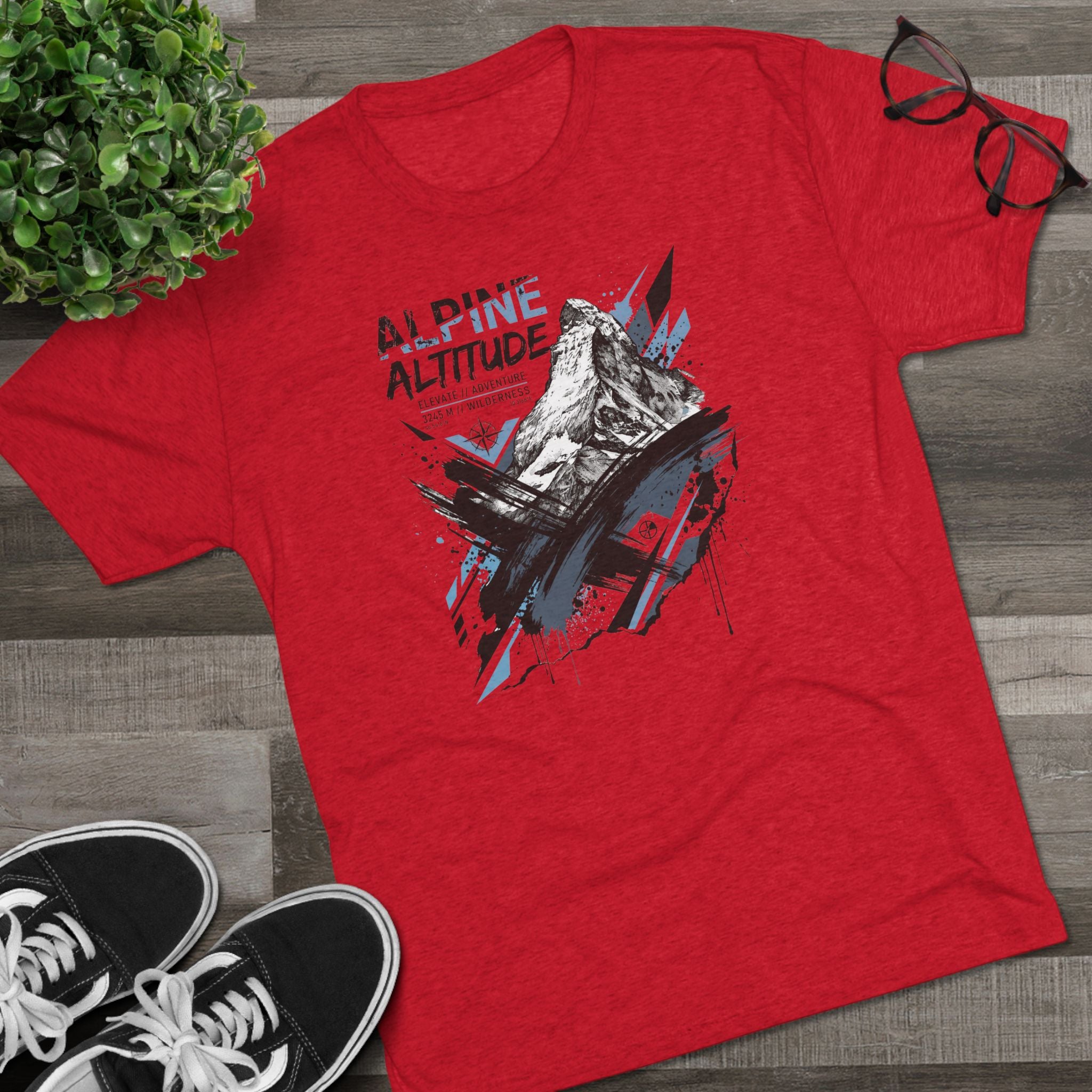 Red unisex T-shirt with mountain peak illustration in blue and black paint